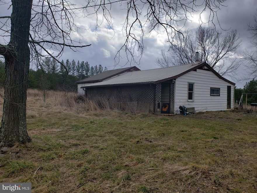 A great place to practice your renovation skills.  The house needs your imagination but the 3.94 acres is great value.  There is a small pond at the rear of the property and plenty of space for gardening, pasture, horses or other livestock.  The list price is firm but the opportunity is awesome! Come see it soon!