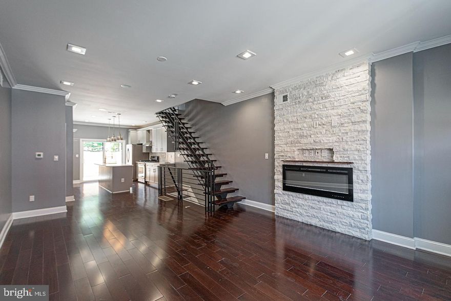 *Available 4/1*

This show stopping 4 bedroom, 5 full bathroom home features hardwood floors throughout, recessed lighting, central air and high end finishes! The open floor plan living room invites you in to get cozy by the fire place then leads into a stunning kitchen with gray cabinets against white subway tile and quartz counter tops plus an island and breakfast bar, and stainless steel appliances. Through the sliding glass door is a massive fenced in patio to make your perfect garden oasis. Downstairs, the finished basement offers additional space for a theatre room or home office with a full bathroom. The second floor has two spacious bedrooms, each with large closets, and an en-suite bathroom in the rear bedroom, the washer/dryer closet and hall bathroom. The third floor has a bedroom in the rear with an en-suite bathroom and the primary bedroom in the front featuring a gorgeous bathroom with double vanity sinks and standing glass shower with three shower heads. Finally, you and end your day watching the sunset over the line on your very own roof deck!

Lease Terms: Generally, 1st month, and 1 month security deposit due at, or prior to, lease signing. Other terms may be required by Landlord such as last month's rent upfront. $65 application fee per applicant. Tenants are responsible for: electricity, gas (if applicable), cable/internet and $10/mo technology fee. Water is a flat monthly fee of $105. Additional fees or requirements may be applicable for units with Homeowners or Condo Associations. Landlord Requirements: Applicants to make 3x the monthly rent in verifiable gross income, credit history to be considered, no evictions within the past 5 years, and must have a verifiable rental history with on-time rental payments. Exceptions to this criteria may exist under the law and will be considered. Cosigners will be considered.

*Sorry, no pets