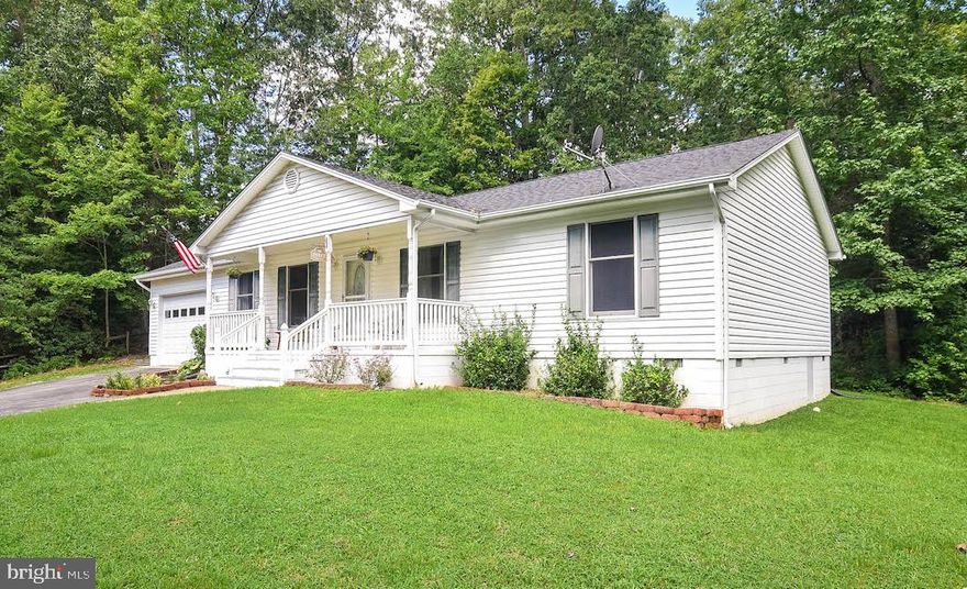 Move in ready, and looks great.  Nice one story with open floorplan.  Vaulted ceilings in kitchen/ family room.  Three generously sized bedrooms with 2 full baths.  Great front porch, and even better rear screened porch and deck over looking the trees.  Large yard with plenty of privacy at the street.  Paved driveway and one car attached garage.