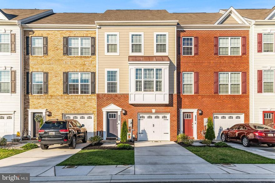 This beautiful home built in 2019 shows like a MODEL HOME!  This is your chance to own a home that is like new construction without the price tag!  Be welcomed into a lovely open foyer area and back to a large recreation room that walks-out to the fully fenced yard.  Lower level also features a half bath and garage access.  The sunlit main level is wide open with a beautiful and generously sized kitchen, eat-in kitchen area, large pantry and sliders to new composite deck.  Primary bedroom is situated in the front of the house with large windows and a lovely en-suite bathroom.  You'll also find two additional bedrooms, full bath and laundry area.   You will fall in love with this home the second that you walk in!