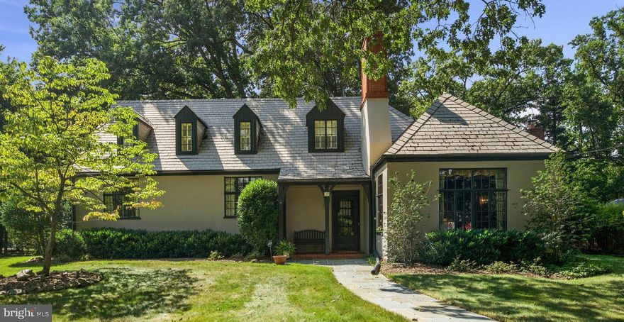 Magnificent! This  one-of-a-kind masterpiece of architectural excellence & craftsmanship will take your breath away! Very well-built, spacious and well-laid-out floor plan of 10' ceilings , six large  bedrooms, two and one-half baths, gorgeous  entry foyer, elegant dining room & stately living room with built-ins, arched entryways,  large renovated kitchen with quartz countertops,  recessed lighting, glass enclosed sunroom overlooking large level lot, covered brick patio — all within short distance to Rockville Town Center & Metro! You’ll also enjoy private parking with a 2-car garage and pretty semiprivate landscaped surroundings. It is a home from another era &  exquisite in detail.  Open house Sunday Sep t 17from 1-4.  Offers due Monday night presented Tuesday 9/19 eve! Truly a must see!