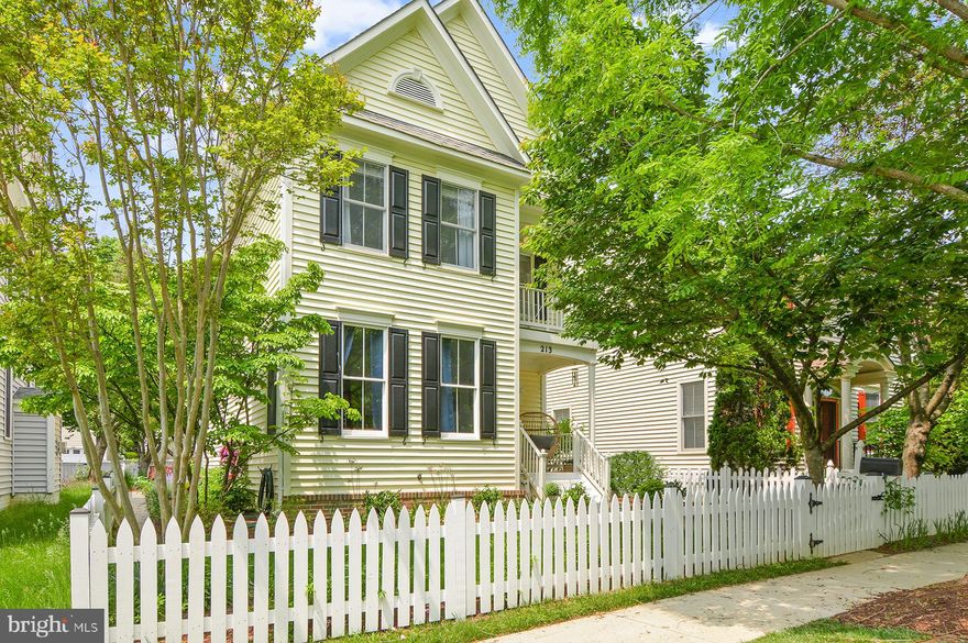 Welcome to this stunning home in desirable King Farm! Pride of ownership shows in the maintenance and updates throughout this 4 story, light filled residence on Creek Valley Ln. Enter through the charming front porch to the foyer, where the beautiful hardwoods span across the first floor with neutral paint throughout. The front sitting area or office is drenched in natural light. Beyond, find the dining area with decorative wainscoting and chair rail. In the kitchen, you'll find ample vibrant modern cabinetry with upgraded hardware, granite counter tops, a pantry, and upgraded black stainless appliances including a gas stove. The spacious living area off the kitchen contains a gas fireplace and a door/window combination with interior shutter blinds leading to the back deck, patio, and 2 car detached garage. The floor plan and flow of the main kitchen and living space is lovely and open, providing easy integration from indoor to outdoor living spaces and room for entertaining. The first floor is completed with a powder room, highlighted by additional wainscoting. On the second floor, the spacious primary suite contains a walk in closet and amazing en suite bathroom redone in 2020 with separate soaking tub, glass surround fully tiled shower with seat, porcelain floors, and double vanity. Gleaming hardwoods span the hallway and bedrooms. There are two more sizeable bedrooms on this level, and the full bath off the hallway was just redone in 2023, featuring amazing tile upgrades and new vanity. The third level/loft, fully finished in 2021 for more square footage, contains a 4th bedroom and storage, office, or craft room. The fully finished basement contains an additional full bath, and plenty of working, living or sleeping space to suit your needs. Outdoors, enjoy the expansive brick patio, thoughtful and detailed landscaping surrounding the home with a variety of seasonal flora and fauna, the picket fence enclosing the entire lot, and storage or parking offered by the detached garage. This gem in King Farm is waiting for you to make it your own.