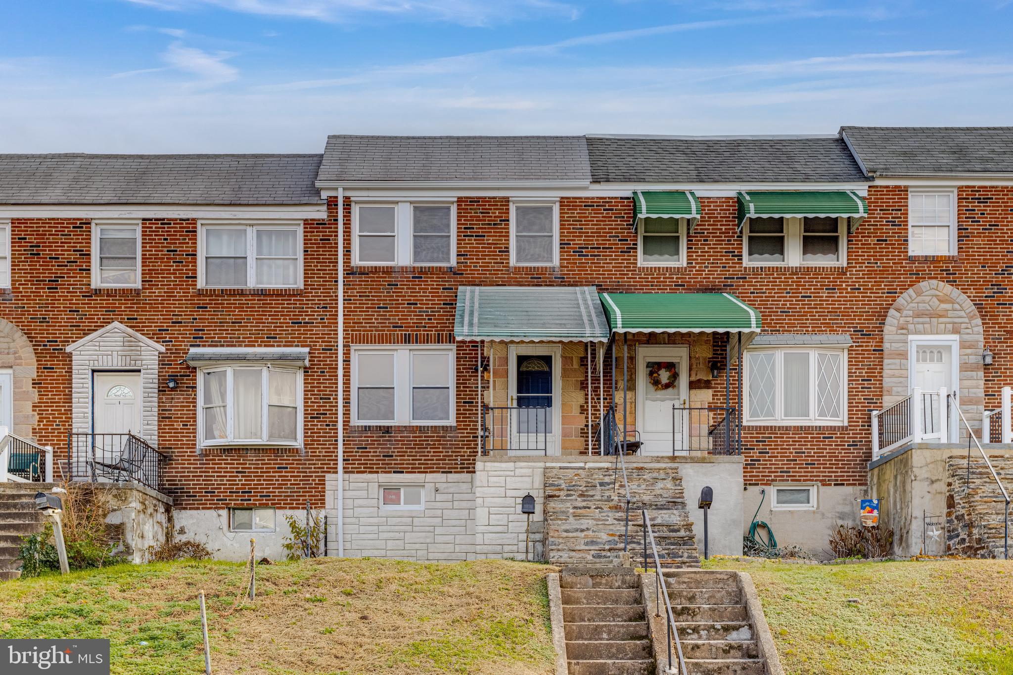 Move-in ready brick townhome in Anne Arundel County with Baltimore Skyline VIEWS! This lovely home has been upgraded to include a BRAND NEW kitchen with white shaker cabinets, quartz countertops, beautiful backsplash and ALL NEW Stainless steel appliances. Brand new heating and air conditioning system (2023) Brand New Water Heater (2023) ALL New Vinyl Plank Flooring throughout the main floor, kitchen and basement. Brand new carpet just installed upstairs. Fresh Paint. Updated bathroom with stunning tile surround. Finished walkout basement, with covered back porch for those cool summer nights and off street parking pad in the rear. Centrally located to major highways, and shopping. Less than 15 minutes from Federal Hill, Port Covington and McHenry Row restaurants and entertainment.