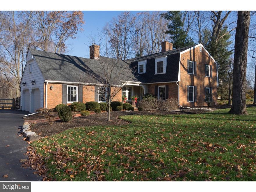 Welcome Home! This classic, charming Dutch Colonial residence provides a lifestyle opportunity to live in a sought-after location with move in ready accommodation. It's got style, it's got grace and so well cared for, exuding character and charm throughout. The unique mid-century modern design and thoughtful floor plan allow for spacious ease and flow from room to room. Quality workmanship is displayed with lots of hardwood flooring, HVAC 2-Zoned system,(newly installed), new roof & gutters, (all) replacement windows, bathrooms renovated with granite counters, new cabinetry, seamless shower and ceramic tile flooring. Plus, complete interior has been freshly painted in soft neutral tones. The Den/FR boasts an extensive brick wall, hearth and fireplace with a Jotul wood stove insert. Plus, a wall of French-door sliders allowing open views of the property with access to an expansive paved brick terrace & yard. Just off the foyer, the generously sized formal living room offers a sophisticated flair with lots of windows & natural light, a wood burning fireplace with a traditional mantel & marble surround giving a lovely focal point to the room. Two sets of folding French doors provide more architecture. The formal dining room is well-done to accommodate a large dinner party with additional built-in window seating for entertaining. There is also plenty of room when gathering in the open kitchen and breakfast area offering an additional wall of windows for added ambiance and natural light. There is an abundance of cabinetry and counter space, plus new LG French Door Frig, Bosch dishwasher, double-wall oven & cooktop. Laundry Room features brand new Electrolux front-loading washer & dryer,cabinetry, ceramic tiled flooring, utility sink and an entrance/exit door. The upper level highhights the master suite w/full bath, water closet, radiant heated stone floor, and sitting room area with walk-in-closet. 3 more ample bedrooms are serviced with an additional renovated full bath. Lots of closets throughout plus a floored attic gives lots of storage space. Walk-out basement for additional living space. Over-sized 2 car garage, beautifully landscaped, gated rear yard with cedar fencing. Walking distance to Makefield Highlands Golf Course. Shopping, cultural events and fine dining nearby. Blue Ribbon Schools. Drive to Philadelphia 30 mins. Princeton, or NYC 90 mins.  Best of Bucks County Living!