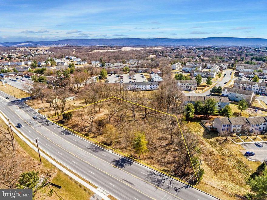 DEVELOPMENT OPPORTUNITY.  Building Lot ONLY.   Highly visible site located on Robinwood Dr, Hagerstown, MD.   Site is sandwiched between the expanding Meritus Medical Campus as well as the Hagerstown Community College and surrounded by various residential neighborhoods. The site consists of 1.2 acres and currently has a PUD overlay for zoning.  Buyer to conduct their own Due Diligence.  Call for more details