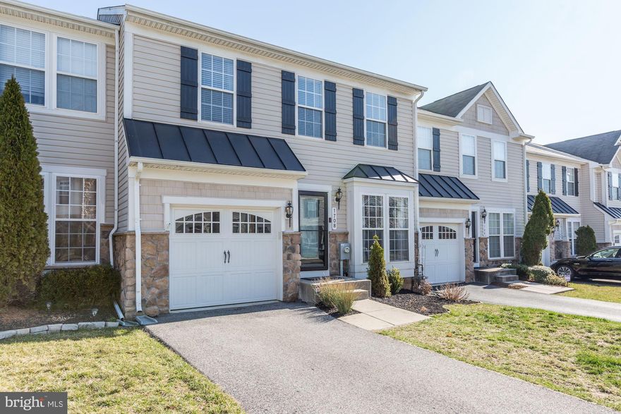 Stunning 3-bed 3.5-bath townhouse in peaceful Villages of Dorchester. Enter to gleaming hardwood floors throughout main level. Bright and airy with over $40K in upgrades! Spacious kitchen features ample cabinet space, island, breakfast bar, marble counters, and all stainless-steel appliances. Vaulted ceilings on 2nd floor make for spacious bedrooms.  Master suite boasts luxurious full bath with separate shower, plus walk-in closet. Finished basement and rear deck make for perfect entertaining spaces. Attached 1-car garage plus additional driveway and street parking. Community offers pool, walking paths, clubhouse, and tot lots. Conveniently located to Fort Meade/NSA, Arundel Mills Mall, Costco, BW Pkwy, Rt. 100, and more!