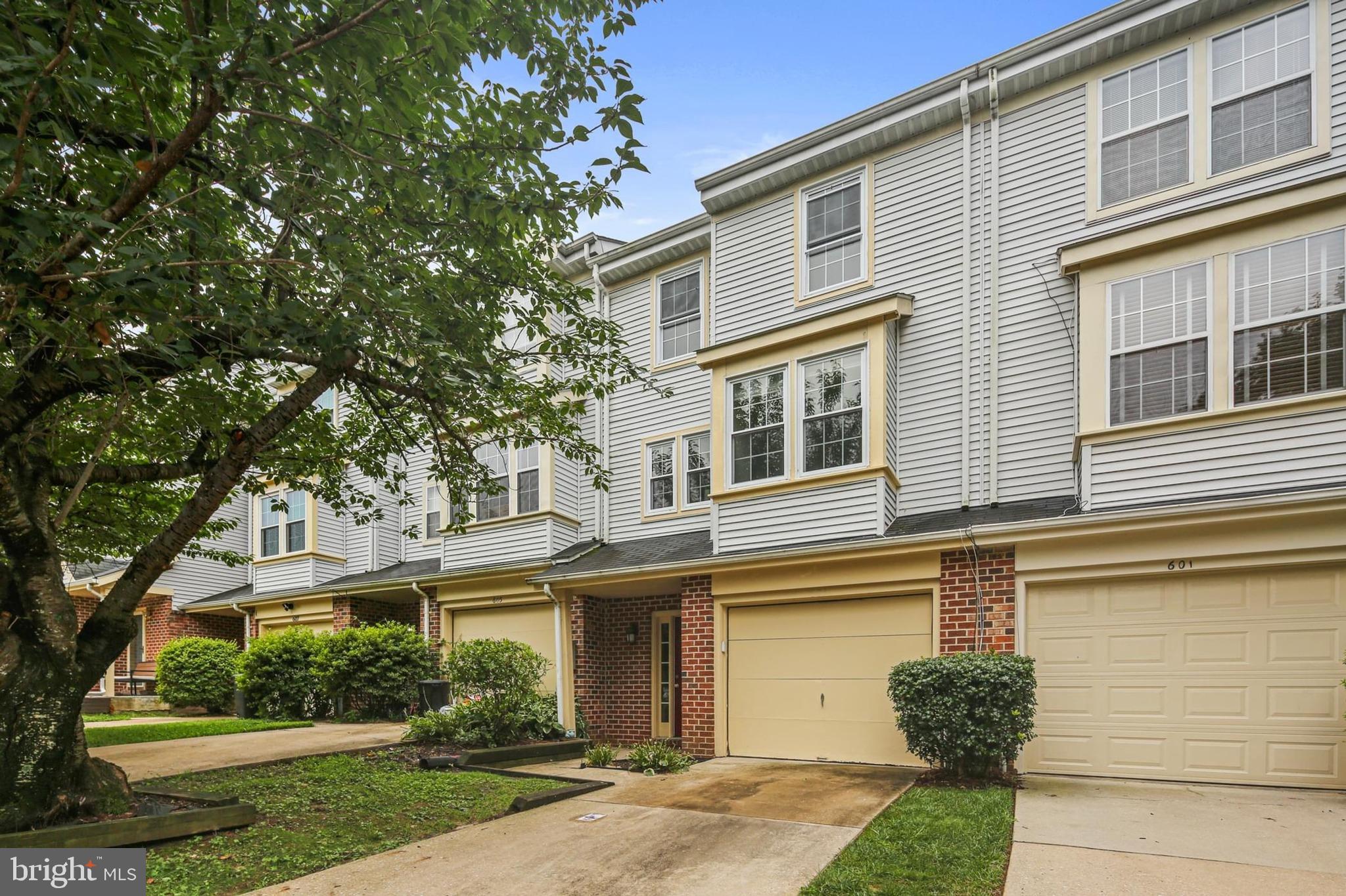 Welcome home to 603 Brickston Rd! A beautifully maintained 3 bedroom, 2.5 bathroom, 1-car garage townhome boasting over 1550 sq ft of living space in the sought after Village of Timber Grove community! The main level showcases an open concept floor plan with sun-filled windows, gleaming hardwood floors, gas fireplace, recessed lighting and a freshly painted neutral color palette. The kitchen features corian countertops, matching appliances and a large pass through window connecting to the family room. The upper level features 3 generously sized bedrooms, 2 full bathrooms, brand new carpeting and are all freshly painted! The primary bedroom has a vaulted ceiling, updated bathroom and has 2 side by side closets. The lower level features a bonus room/4th bedroom with walk out access to the back yard and a full laundry room. The deck located off the main level is made of low maintenance Trex decking material, including a large space that’s ideal for outdoor dining. ***Additional Features and Updates include: New carpet/entire home painted (2025), New Trex Deck (2023), New HVAC (2022), New Roof (2017)*** This lovely home is conveniently located close to an excellent array of dining, shopping, entertainment, major highways and walking distance to the community clubhouse and pool! This one will not last long! Schedule a showing today!