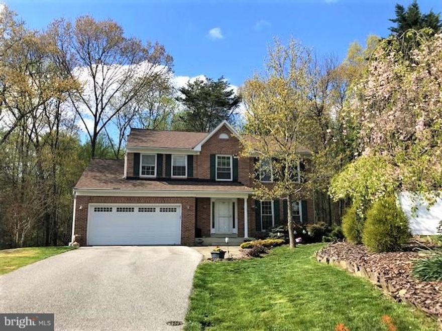 Lovely 4 bedroom, 2 full, 2 half bath Trinity home beautifully maintained by original owner!  Featuring 12' x 16' patio enclosure & 20' x 24' elevated deck overlooking tranquil wooded setting as well as extensive hardscape/landscaping!  Almost new premium roof and newer replacement windows. Never clean gutters again with Gutter Helmet system included! Invisible Fence around perimeter of home!