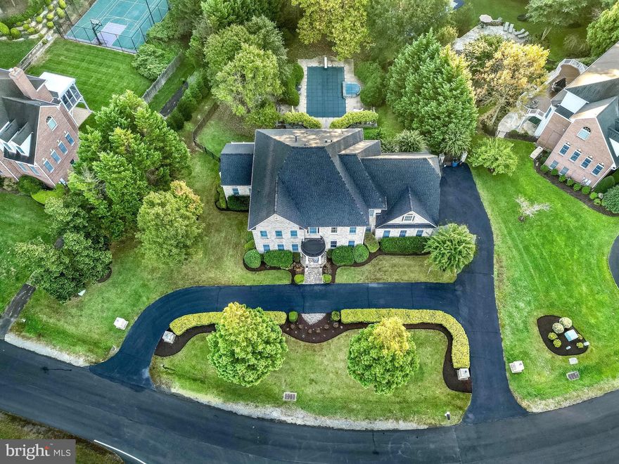 Estates at Colvin Mill, Best location in Great Falls, Minutes from Tysons Corner, Luxury 3 side brick home, Circular Driveway, 5 Bedrooms, 4 Full baths, 2 half bathrooms on main floor, Walk out Basement with a Theater room and a Bar, 3 Car Garage, 20X40 ft. Pool, Back to the woods and pathway to Difficult Run Park Creek, 2nd staircase to upper floor, No HOA, New Roof 2022, New Deck 2023, 10 ft. Ceiling on Main floor, 9 ft. Ceiling through out, Private neighborhood, Great Falls Schools!