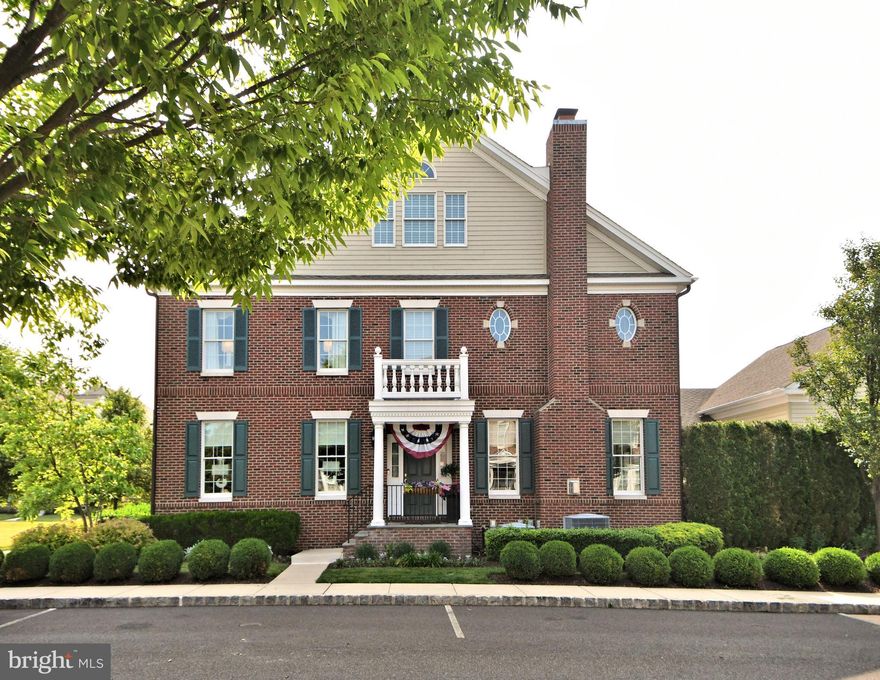 A true designer's showplace nestled in the highly sought-after Newtown Walk neighborhood. This exceptional end unit townhome, bursting with custom amenities, epitomizes refined living across four luxurious levels. This home offers 4 bedrooms and 4.5 bathrooms, a full finished basement to cater to all your lifestyle needs. Each room exudes elegance, being tastefully decorated and carefully designed for superior comfort. The gourmet kitchen, a showpiece of its own, is fully equipped with upgraded cabinetry, newly finished state of the art quartz counter tops and backsplash, center island with farmhouse sink, premium appliances including Sub-Zero refrigeration, Jenn Air wall ovens and Kitchen Aide cook top and dishwasher. Adjacent to the kitchen, a custom-built wet bar adds a touch of opulence, providing direct access to the garage with a staircase leading to a luxurious billiards / study room. The spacious family room is adorned with abundant windows flooding the space with natural light and features a cozy gas fireplace for those chilly evenings. Just off the family room opens to the exterior deck for outside activities. The first level also accommodates a formal living and dining rooms, providing the perfect setting for holiday celebrations and family gatherings. The second level includes the master bedroom with walk-in closet and bath which serves as an oasis of tranquility, featuring a luxurious (14) jetted tub, seamless shower and private commode. Two additional bedrooms, a full laundry and a convenient hall bath complete the 2nd level. The third floor presently is served as an additional bedroom with a full bath and could be transformed into a study according to your preference. The finished basement was designed for entertainment.  It showcases a custom-built bar complete with built-ins, granite countertops, and refrigerator. A bespoke media room, adorned with custom wainscoting, gas fireplace, and lush setting makes for the perfect spot for movie nights. Beyond entertainment, the basement also houses a game area with custom built-ins, an ample unfinished space for storage, an office, and a full bath. Some of the recent upgrades and amenities include a complete new color scheme, newly finished flooring throughout both the main level and the 2nd floor, the billiards room and all staircases, new powder room, updated kitchen counters, center island and cabinetry, entire home water treatment system including reverse osmosis in butlers pantry, "California styled" custom finished closets,  built-in sound system and much more. Just a jump hop and  a skip away from the vibrant stores and restaurants of Newtown Borough, this home provides an unmatched lifestyle of luxury.