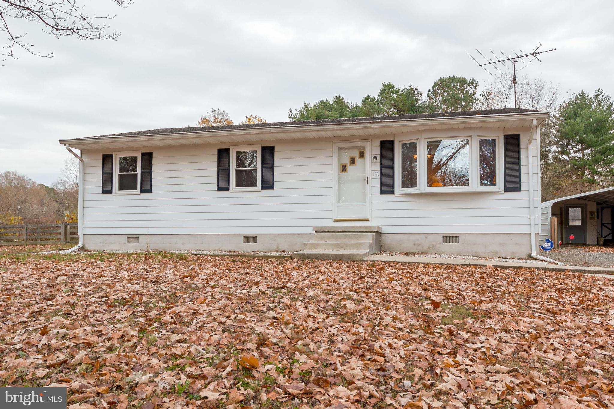 AFFORDABLE & ADORABLE! New roof, new appliances, newer HVAC, refinished hardwood floors, tile in the baths, screened porch leading to patio overlooking a huge, fenced yard with new fencing. 2-car carport and three sheds make this home a lovely space for you!