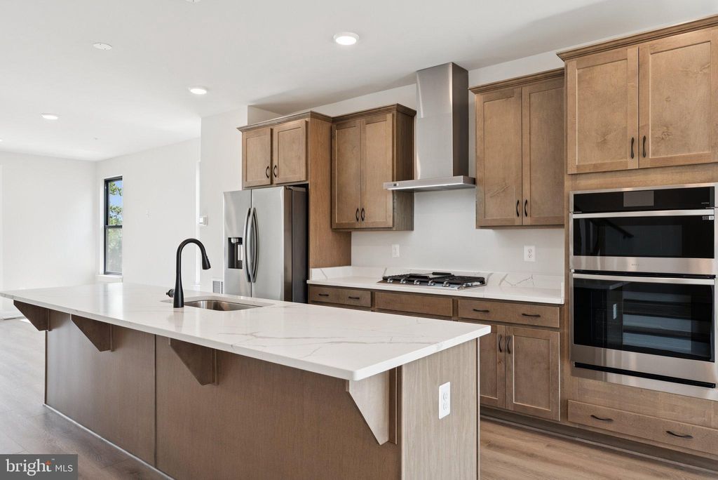 Photo of 5121 Rosie Oliver St #59E, BOWIE, MD 20715 (MLS # MDPG2167500)