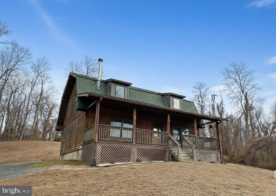 Escape to your own private oasis in this charming 3-bedroom, 2-bathroom log home nestled on nearly 4 acres of picturesque land. Enjoy the peace and tranquility of a country-like setting while still having easy access to modern conveniences.

Inside, you'll find warm wood floors throughout the home, creating a cozy and inviting atmosphere. The kitchen is equipped with stainless steel appliances and granite counters and has an open lay out for entertaining. The open beam ceilings are also truly stunning!

Outside, the usable yard offers plenty of space for relaxation, recreation, garden beds, and pets. The several huge shed provide ample storage for all your toys and tools. The partially fenced yard offers a secure space for pets or children to play. I envision corn hole boards and a large firepit for evening and tending to gardening in your future.

And for those who love the water, enjoy private access to the nearby waterway, Allens Fresh, for fishing, light boating, or simply enjoying the scenic beauty. Only a select few houses have access to this area, which includes a boat ranch and picnic area.

Don't miss this opportunity to own a piece of paradise! Schedule your showing today.  Buyer to verify all information.