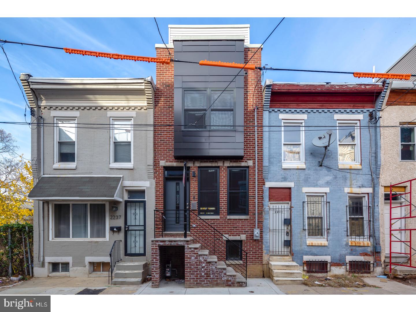 Exceptional new construction built by one of Philadelphia's most recognized developers, V2 Properties, which is located on a quiet block in the heart of Point Breeze. As you enter the home, immediately notice the attention to detail with crown molding, wide-plank hardwood floors, and surround sound speakers - wired and built into the living room, master suite, and roof deck. The eat-in kitchen features modern granite countertops with an island, soft-close cabinets, and stainless steel appliances. This home includes a ring doorbell that can be utilized through smartphone, as well as a security system. The fully finished basement has a full bathroom. All bedrooms have ceiling fans already installed, which separate this property from others. Third floor master suite boasts two master closets, a wet bar, and master bath with dual vanity and glass shower. Walk up to the roof deck to entertain and appreciate the breathtaking Philadelphia skyline. Take advantage of a 10-year Tax Abatement, and close proximity to Rittenhouse, University City, Stadiums, and 76. Great value new construction with comps listed on the block for $420k and $450k!