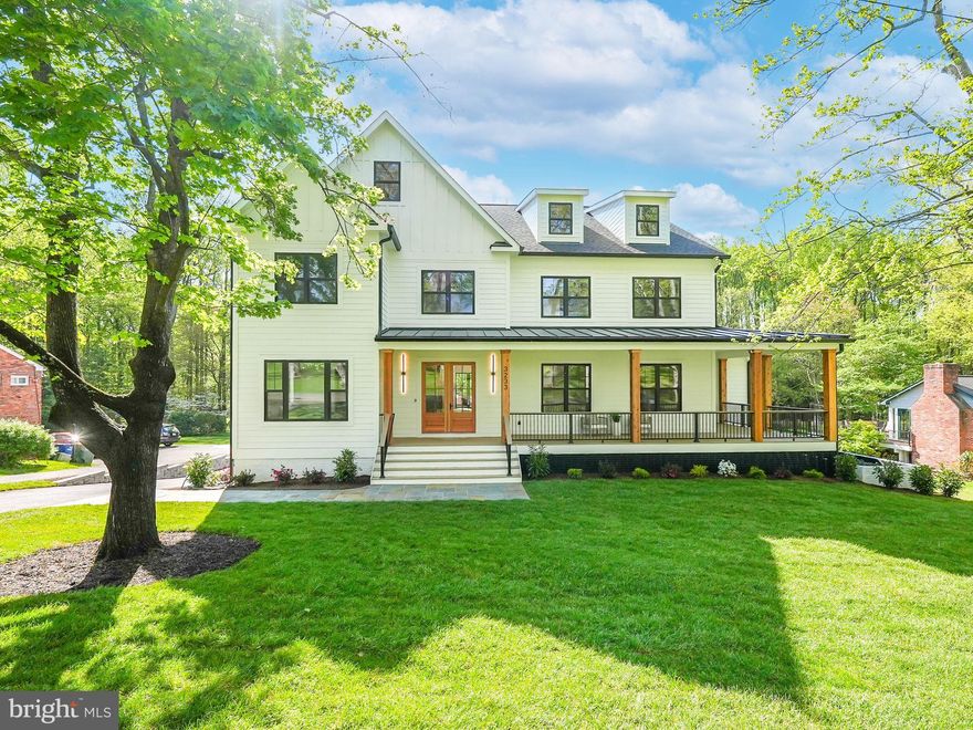 Step into this stunning 6-bedroom, 6.5-bathroom home with 7,176 total square feet and a side load 4 car garage, meticulously designed to offer charm, relaxation, and effortless entertaining. Nestled on nearly an acre of flat outdoor space, this home is perfect for weekend barbecues, family gatherings, or simply enjoying the outdoors. The beautiful TimberTech rear deck features stylish TimberTech Impression railings with a drink ledge, a gas line for grilling, and a covered portion complete with a dual-sided fireplace—ideal for evening outdoor relaxation. The covered wrap-around front porch invites you to sip coffee or lose yourself in a good book.
Inside, the heart of the home is a chef’s dream, equipped with high-end stainless steel Thermador appliances, including a built-in 48” refrigerator, a 48” double oven gas range, two dishwashers, and a microwave. The expansive 11-foot island with a prep sink makes meal preparation a breeze, while the dual dishwashers ensure cleanup is quick and easy. Elegant Luma Taj quartz countertops and a spacious walk-in pantry with a convenient dumbwaiter elevate this kitchen to the next level. Rich 7.5-inch European white oak floors and soaring 10-foot ceilings create a warm and inviting atmosphere throughout.
The formal dining room, complete with a dry bar and beverage center, is perfect for hosting gatherings. The two-story, light-filled family room offers a cozy double-sided gas fireplace with a custom white oak mantel. It seamlessly connects to the covered portion of the rear deck, extending your living space outdoors. For those who work from home, a main-level office provides a quiet and functional space. Retreat to the expansive owner’s suite on the upper level, featuring a spa-like bath with a soaking tub, dual vanities, and a spacious custom-built walk-in closet. Also on the upper level is a versatile loft area overlooking the family room, already wired with Cat6, making it perfect for family movie nights or game sessions. Three additional ensuite bedrooms and a spacious laundry room with quartz countertops, ample storage, and a sink complete the upper level.
The lower level is designed for entertainment, featuring a flexible media room and a spacious recreation area with a wet bar and dual-zone beverage center. An additional ensuite ensures your guests feel right at home.
Built to last, this home boasts premium finishes, including dual-zoned HVAC systems for year-round comfort, a 75-gallon gas water heater, energy-efficient Andersen windows, wiring for Sonos surround sound with 10 built-in speakers throughout, and Cat6 wiring on every floor—delivering thoughtful design and peace of mind.
Located in a prime area, this home is just minutes from Eakin Park, Fairfax Hospital, I-495, Route 50, and Dunn Loring Metro Station. The vibrant Mosaic District and top-rated schools such as Woodson High, Frost Middle, and Mantua Elementary are also within easy reach, making this the perfect place to call home.