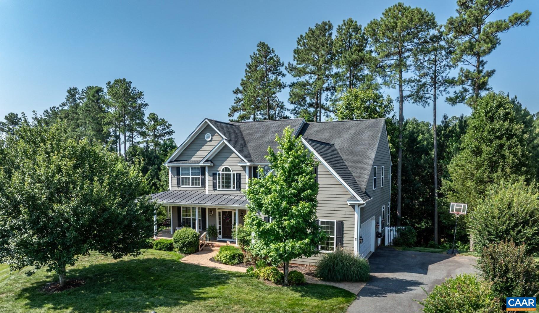 Exceptional value for this stunning Colonial home currently priced $20K below appraisal on a quiet cul-de-sac setting to including high-end upgrades w/fully finished terrace level in sought after, amenity filled, golf community of Spring Creek. Enter from wrap-around porch into the stunning 2 Story foyer w/grand waterfall staircase. This 4300+ sf home w/Hardi siding boasts several upgrades including Cherry hardwood floors, 42"cherry soft-close cabinets, granite counters, & 3 piece crown molding in several areas. Main level has office w/glass French doors, family room w/gas fireplace, powder room, formal dining, gourmet kitchen w/island, morning room w/palladium windows flowing to refreshed deck for privacy or entertaining. 1st level tiled laundry room includes built-in counter w/cabinets & utility sink, leading to side load garage w/high ceiling, shelving, & EV level II - 240V outlet. Upper level includes owner's suite w/3 sets of French doors leading to bonus/fitness room, owner suite bath w/soaking tub & 2 walk-in closets. 3 addtl. bdrms, full bath, & loft area. The sizeable terrace level offers a large living/rec area, addtl. bedroom w/French doors, full en-suite bath, covered terrace patio, extra storage. Price to sell!!,Cherry Cabinets,Granite Counter,Fireplace in Family Room