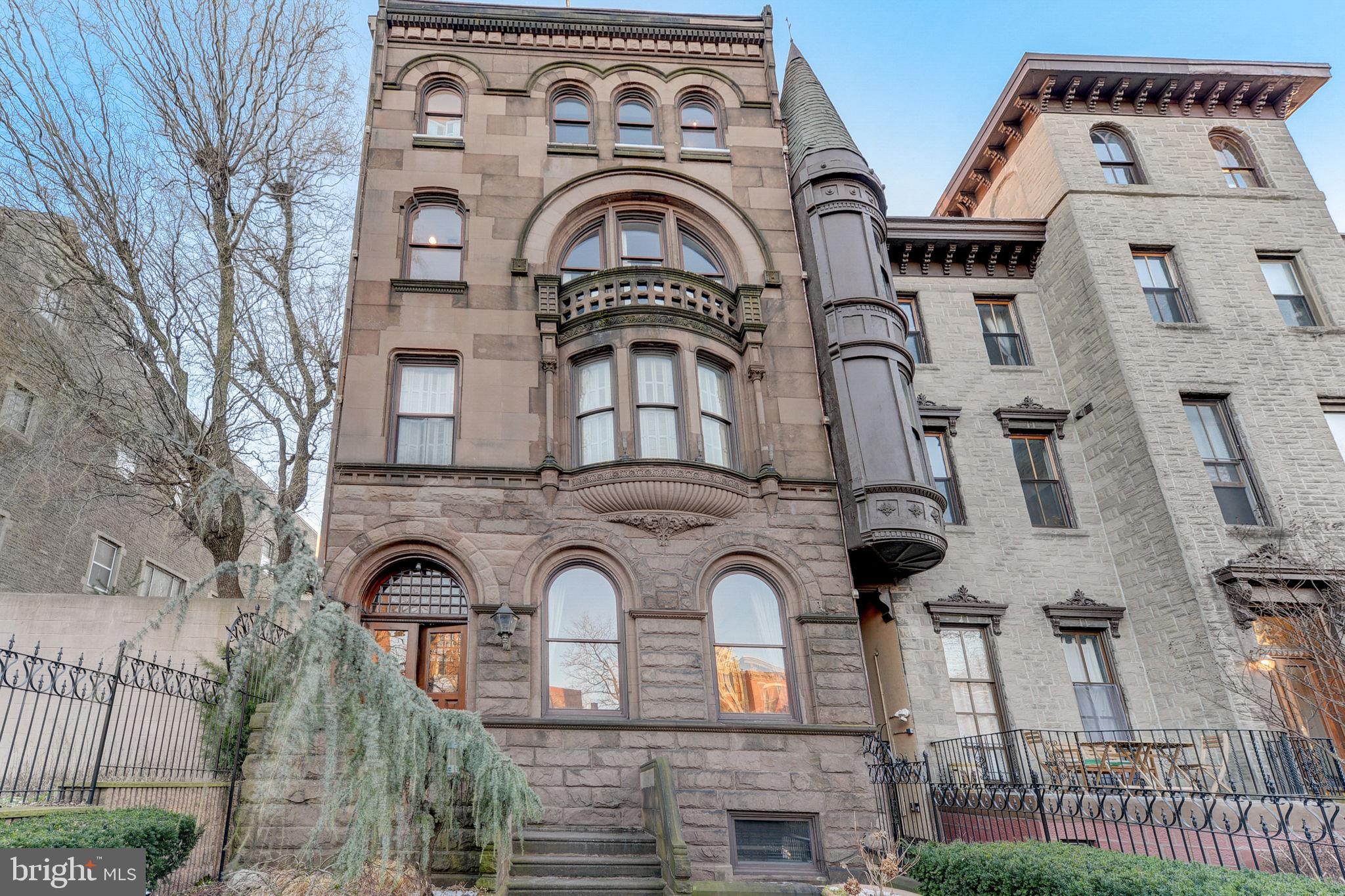 Introducing a historical masterpiece, the crown jewel of the Art Museum in one of the area's most sought-after streets, 2220 Green Street stands as a testament to exquisite craftsmanship and timeless elegance. Originally constructed in 1885, this sculptured 9745sqft, immaculately maintained brownstone spans a full city block from Green to Brandywine and is a fusion of heritage and luxury living. The exterior of this residence is a work of art in itself, with meticulously landscaped grounds gated for privacy and tranquility. From the enchanting front entrance on Green Street to the secluded back access on Brandywine, the expansive 2,000+ square foot courtyard is perfect for family gatherings or large exclusive events. Adorned with 7 captivating fireplaces in good working condition, stone pavers, and lush gardens, this private oasis is designed for unforgettable outdoor gatherings. An oversized two-car garage with interior access adds to the convenience and exclusivity of this estate. Step inside to experience a symphony of historical charm, incredible attention to detail with luxurious molding and woodwork throughout the home. The interior boasts deep, rich millwork, marble trimmings, and sculpted fireplaces, maintaining its historical allure while offering contemporary conveniences. The residence features two full kitchens—a main dining area kitchen, a full-scale commercial kitchen, perfect for hosting grand events and seamlessly connecting to the outdoor courtyard. This 6 bedroom, 7.3 bath majestic estate is waiting for the distinguished buyer to make it their own. The home further includes a media/game room for entertainment, a well-appointed guest suite for visitors, and a full apartment for caretakers with its own exterior entrance. Every aspect of this property exudes magnificence and sophistication, making it a must-see for discerning buyers seeking a harmonious blend of history and modern luxury. An elevator provides convenient easy access from the lower levels to the rooftop pilot house 6 levels up, ensuring accessibility for all ages throughout. One of the property's most striking features is the expansive roof deck, offering breathtaking views of the city skyline, the picturesque Art Museum, and mesmerizing sunsets over the West. Below, an oversized brick wine cellar awaits, complemented by a secure vault for personal belongings and even a private shooting gallery for enthusiasts. This home is not to be missed, come create your legacy property today.