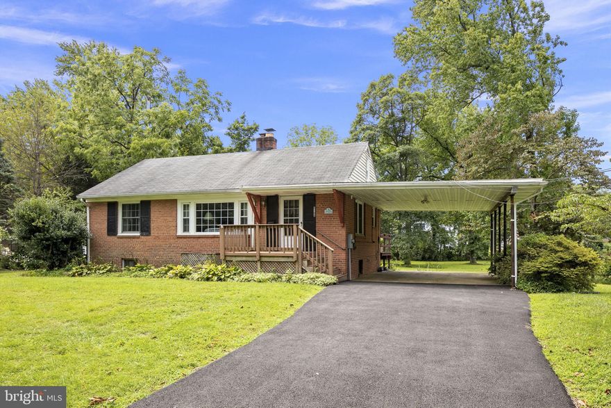 One time opportunity in prime Mt. Vernon location! Solid brick rambler on gorgeous half acre lot in waterfront community with private water access for its residents. Ideal for launching your canoe/kayak or SUP board! The home's features include: two finished levels, replacement thermal pane windows, beautiful hardwoods, wood burning fireplace, finished lower level with direct outside entrance and kitchenette.  Covered parking and recently repaved driveway. Plenty of room for expansion and priced to allow you to make this home truly your own! Short distance to Grist Mill Park, Mount Vernon Estate, Old Town Alexandria, and Washington DC!