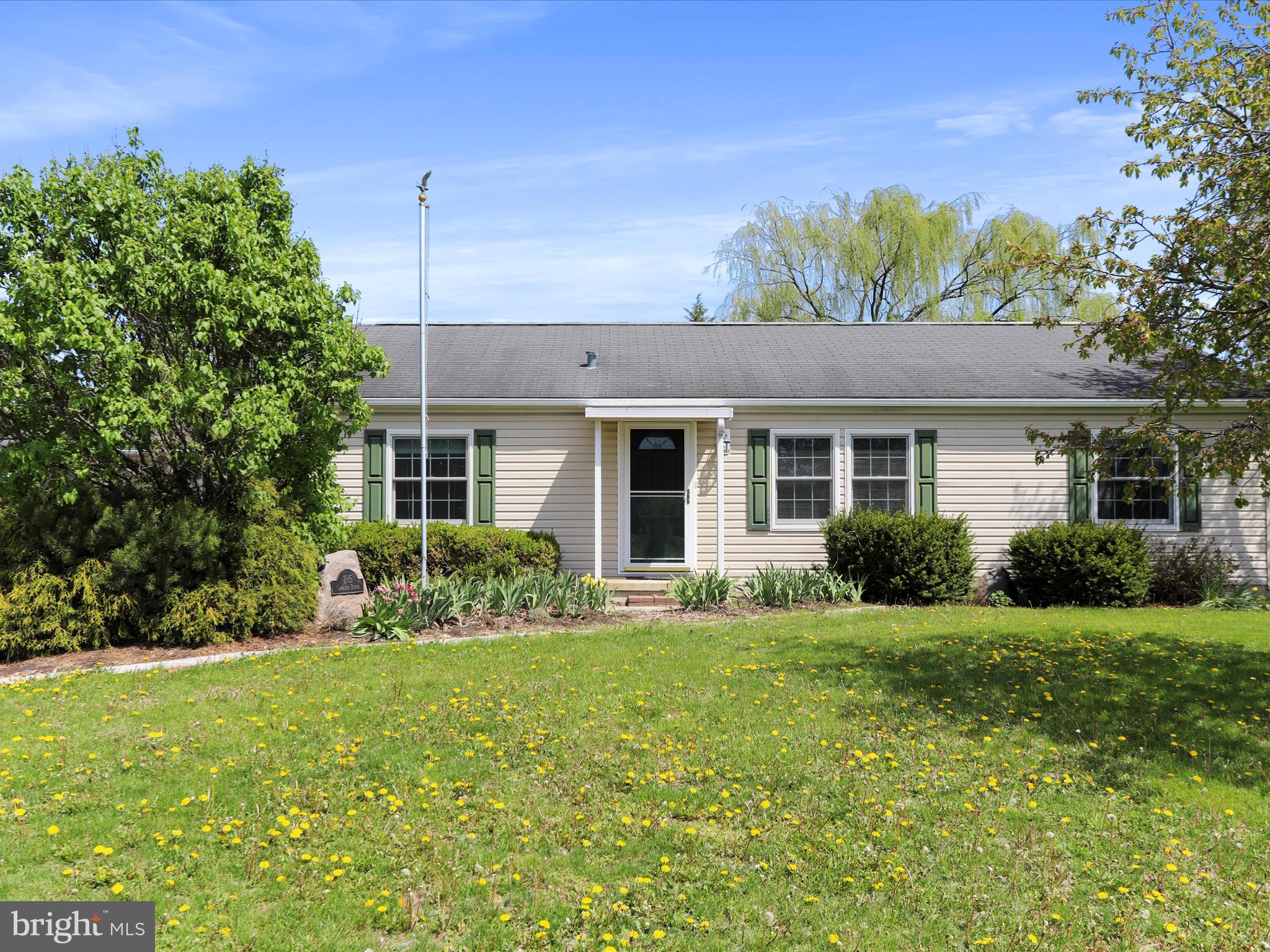 Discover this charming 3-bedroom, 2-bathroom manufactured home, ideally situated on a spacious 0.33-acre lot. Step inside to find a bright and airy interior adorned with crown moldings and ceramic tile flooring, perfect for modern living. The well-appointed kitchen includes essential appliances such as a refrigerator, electric oven/range, microwave, dishwasher, and convenient laundry facilities on the main floor. Enjoy meals in the cozy breakfast area or step outside to relax on the patio. This property also boasts a detached garage with space for two vehicles and additional driveway parking for four. Don’t miss the opportunity to make this delightful property your own!