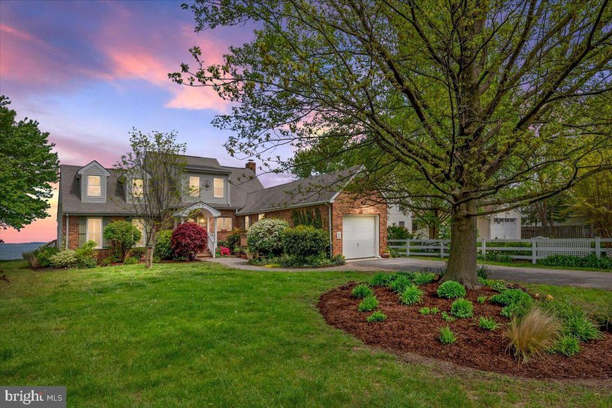 Come see what TRUE WATERFRONT LIVING is all about at this Unbelievable NEW Price!! Rare Opportunity to have a WATERFRONT HOME on the Chester River's DEEP Water with unobstructed sweeping VIEWS and NO Flood Zone! Located in the Desired amenity filled Neighborhood of "Cloverfields" on Kent Island! Featuring 3 Full Bathrooms and 4/5 Bedrooms inclusive of a HUGE MAIN Level Master Suite w/WIC & Incredible Views from the room and the private sun Deck! Seriously BREATHTAKING WATERVIEWS from the Bedrooms and a 2nd floor Veranda to maximize those Views even more! Upstairs Bonus Room is MASSIVE and is PERFECT for a Toy Room, Play room, Game Room, Pool table area, 2nd Living Room and many more options! Waking up to the Sunrise over the Chester River with your morning coffee... it will never get old!! The must-see OPEN Floor Plan is sure to please with Gourmet Style Kitchen, spacious Dining Area and a Beautiful Fireplace in the large Living Room area- all with PANORAMIC WATERVIEWS! This is truly a great spot for entertaining and for big family gatherings! So many PLUSES here with Public Water & Sewer, No Flood Zone, a Private Pier, Rip Rap Bulkhead, 76' of your own water frontage, attached Garage and a HALF ACRE Lot. Community boasts a private Pool w/Lifeguard (just 2 blocks away), Beach w/Pavillion, Boat Ramp, Boat slips, Club House, Playground, Basketball Courts & More! By Boat you can hit the Kent Narrows in just minutes for dinner, head to St. Michael's to explore the quaint town within 45 minutes, Rockhall for some seafood in 30 minutes and sneak around Love Point into the Chesapeake Bay for some deep water Rockfishing under the Bay Bridge! By Car you are close to Balto, DC, Downtown Annapolis, Easton and DE for ease of commuting purposes! By Foot, you can walk to the schools, Library, Parks, Kent Island Bike Trail, Tennis Courts and Ball Fields! Convenient to Shopping, Outlets, Restaurants, Parks, Marina's and Beaches! Come live the SHORE LIFE and experience WATERFRONT LIVING like it should be!   This is YOUR opportunity to move right into this turn-key BEAUTY and just sit back RELAX on the WATER and ENJOY this Dream come true!!  With County Permit Approval, possible in ground pool can be added to the rear left side.