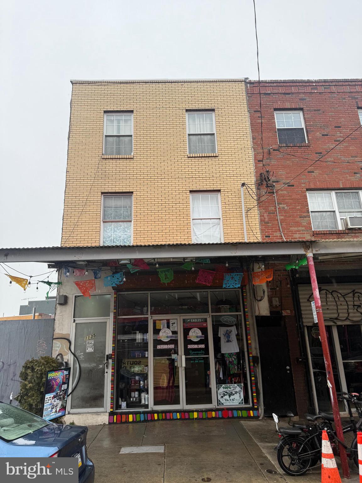 This is Prime real estate cash flow !! Located just off the busy Washington ave in the passyunk square neighborhood. The 1st floor is currently leased by custom t shirt and apparel business, which can access the basement. The side entrance which access to the 2nd and 3rd floor. The 2nd floor features 2 bedroom and full tile bathroom, hardwood flooring, modern finished kitchen, central HVAC. The 3rd floor with 1-bedroom, full bathroom, kitchen with granite top, recessing lighting with spacious living room. The building is fully renovated few years ago and basically maintenance free. This property with cap rate over 6% will be great opportunities to put in your buy and hold real-estate portfolio. Schedule your appointment Today.