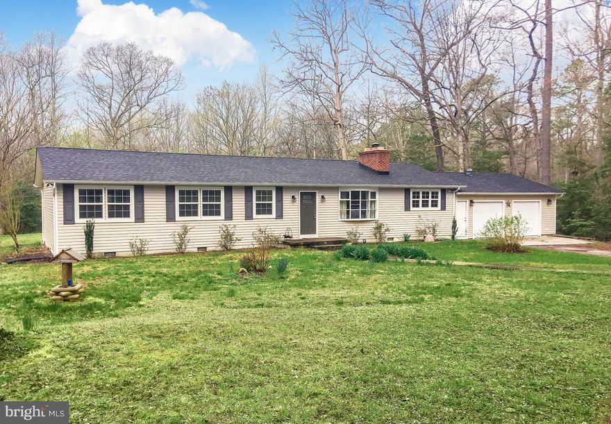 Privacy abounds with this tucked away rambler on almost 4 acres.   One level living at it's best.  This rambler boasts over 2700 square feet of finished space and was completely remodeled in 2016.  3 Bedrooms 2 full baths, Brick Fireplace with Wood Stove insert.  Gorgeous bright and  clean kitchen with granite counter tops.  Living room, dining area, and extra large family room all lead to an enclosed porch and back deck for outdoor entertaining.  Garage has ample space for work space area and also has a wood stove and storage closet.  Both storage sheds also convey.       If you love privacy, this one is for you.