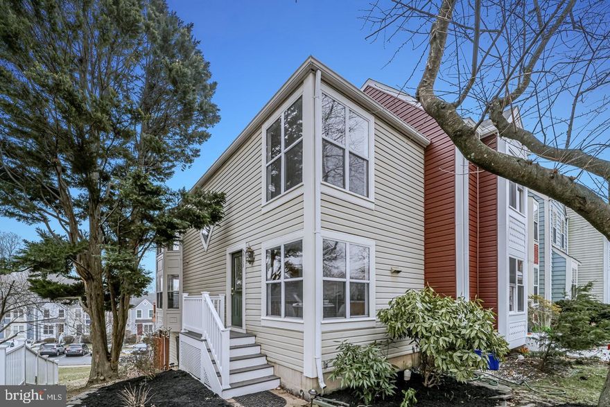 Welcome to this charming, cozy, and beautifully maintained end-unit townhouse in the sought out Kingstowne neighborhood. Filled with natural light on every level, the main living area features a wood-burning fireplace and opens to a spacious deck, perfect for relaxing or entertaining. The upper level offers two bedrooms and a full bath.

The lower level includes a full bath, a versatile recreation room or third bedroom, laundry, and generous storage, with walk-out access to a private deck surrounded by trees.

Kingstowne truly has it all, with amenities galore—multiple pools, two fitness centers, tennis and pickle-ball courts, basketball courts, and over a dozen walking and biking trails. An added bonus is the abundance of parking, with no assigned spaces and plenty of room for guests and gatherings.

Conveniently located close to shopping, the new Inova Springfield/Alexandria Hospital, and just minutes from Old Town Alexandria, this home offers easy access to I-95 and major commuter routes. Kingstowne was thoughtfully designed with an extensive network of walking and biking paths, allowing residents to enjoy an active lifestyle without having to be on main roads, all while keeping dining, entertainment, and everyday conveniences close by.