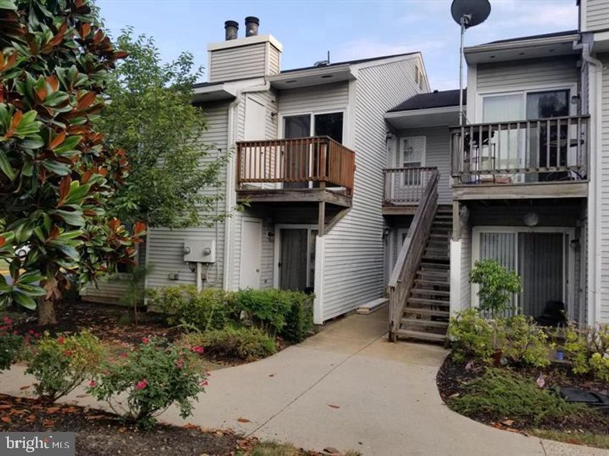Top Floor Home with Vaulted Ceiling, 2 Full Baths, Washer & Dryer in Unit, Freshly painted, Updated Baths. Kitchen that opens to Living area with Fireplace & Sliding Door to Balcony over looking onto common area   Move in Ready