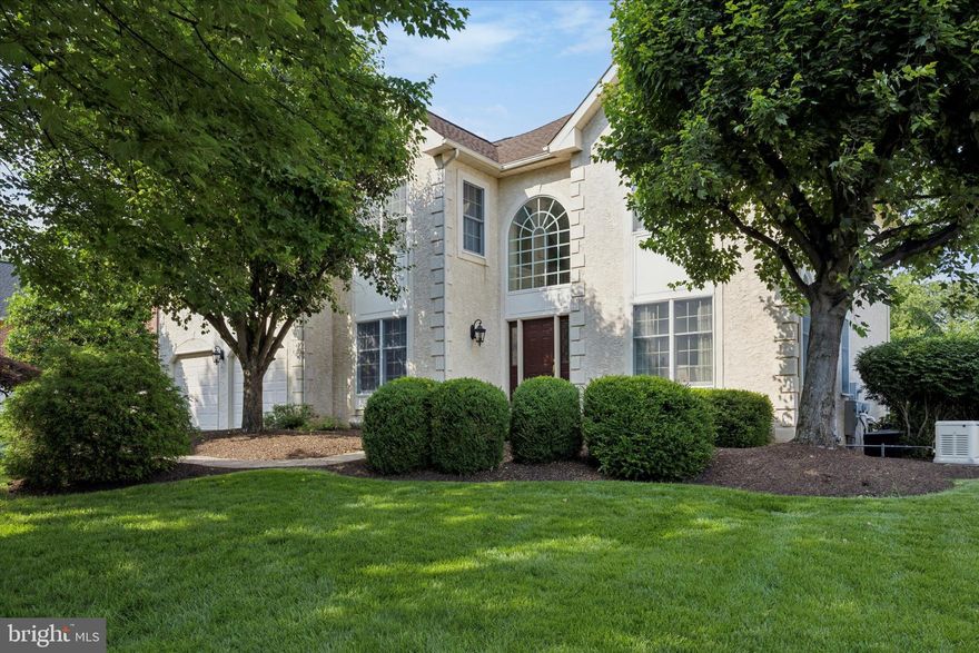 Enjoy the wonderful lifestyle Blue Bell Country Club has to offer and living on the prestigious Arnold Palmer designed golf course.  Welcome to this beautiful 2-story colonial style home in the Village of Spyglass.  This former model home with golf course views offers 4 bedrooms, 3.5 baths and a 2 car garage.  This home has been meticulously cared for and features elegant appointments throughout. Inside you will find a gracious two-story foyer with palladium window above for natural light. The pristine hardwood flooring that greets you, runs throughout the foyer, kitchen, office and hall bath.  To your right, you will find a beautiful living room bathed in natural light, which pours in from the oversized cottage style windows. Through the formal living room, you will find the formal dining room with plenty of room for family gatherings and holidays.  Both the living room and dining room offer recessed lighting, crown molding above & wainscoting along the lower half of the walls for a touch of class & elegance. The spacious kitchen boasts granite countertops, custom stone backsplash, plenty of storage in the 42” wood cabinets, an abundance of recessed lighting, updated appliances, counter seating, pantry & bump out breakfast area with skylight. Whether you're hosting a dinner party or simply sipping coffee at the breakfast bar, this space is perfect for both entertaining and everyday living.  The 2-story family room offers 2 skylights & 2 arched windows highlighting the gas fireplace with pointed brick hearth & wood mantel, perfect for those long cold winter nights.  Off the family room, the beautiful sunroom boasts hardwood floors, vaulted ceiling, plus three walls of windows, a perfect view of the golf course and private landscape.  Off the kitchen through the sliding doors is a large composite deck with beautiful wrought-iron handrails, another area with perfect views of the golf course.   The first floor also offers an office with beautiful handcrafted wood built-in cabinets & recessed lighting.  There is also a powder room, coat closet, first floor laundry with built-in cabinets and access to the attached two car garage. Upstairs, you will find a dramatic approach to the primary bedroom featuring double door entry into the bedroom, large sitting area with bountiful natural light and neutral carpet take center stage in this spacious, ensuite bedroom. You will be pleased to see a separate dressing area, complete with vanity and two closets (including a walk-in). The dressing area leads into a generous ensuite updated bathroom which features a dual vanity, tile floor and nicely remodeled shower, and large newer soaking tub, plus another skylight. Two additional bedrooms with jack & jill bath and 4th bedroom with hall bathroom complete the second floor.  The unfinished basement is ready for your finishing touch, like billiards, ping pong, crafts, exercise and or entertaining and has plenty of room for storage. This home offers a newer roof & skylights, 2 newer HVAC units , battery back-up sump pump , house generator, ( 2021 ), sprinkler system and house alarm.. If natural light is important to you, this home will make you very happy.  Lastly, the location cannot be beat! Enjoy fine dining and theater, shopping malls (Montgomery, Plymouth Meeting & King of Prussia) township parks, trails and plenty of fun restaurants for you to enjoy, plus community college, libraries and well renowned hospitals. Less than an hour from downtown Philadelphia and the airport with very convenient access through Regional Rail and Septa. To top it all off, this home is in the award winning, most sought after Wissahickon School District and voted one of the safest places to live.  A fantastic location in an attractive community that offers a very low maintenance living; this is not just a home, it's a lifestyle.  Call me soon for a private showing.