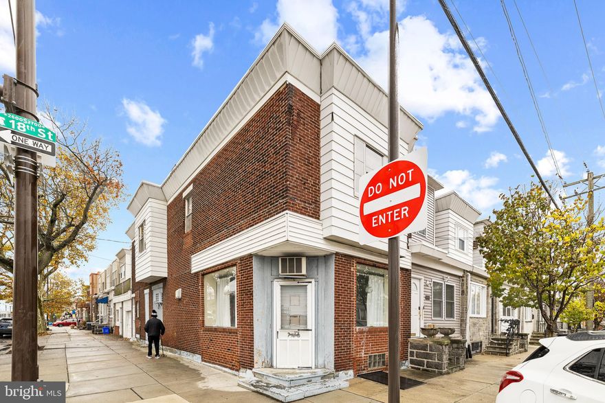 Welcome to 2701 S 18th Street, a prime commercial mix-use corner property located in  South Philadelphia, in close proximity to the  Girard Estates. Situated at the intersection of 18th and Oregon Ave, this property offers an exceptional opportunity for investors seeking a versatile space with endless potential.

Spanning over 2,050 square feet, this property was once home to a salon on the ground floor with a spacious residential apartment above. The layout includes a welcoming main floor with ample space for a variety of commercial uses. The second floor features three bedrooms, 2 full bathrooms and one half bathroom, making it an ideal live/work arrangement.

The property also boasts a curb cut for convenient attached garage parking, accommodating one vehicle, as well as a fantastic roof deck offering panoramic views of the surrounding area. 

Whether you’re looking to continue operating a commercial business or transform the space to suit your needs, 2701 S 18th Street provides a unique opportunity. Don't miss out on this rare offering, reach out today to schedule a private tour.