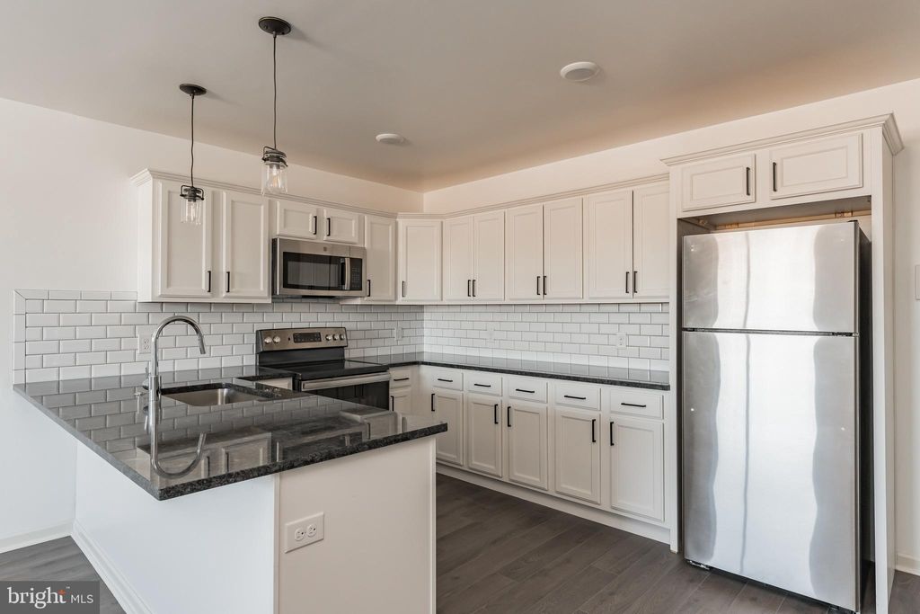 Photo of 6649 Ridge Avenue #A216, PHILADELPHIA, PA 19128 (MLS # PAPH2581950)