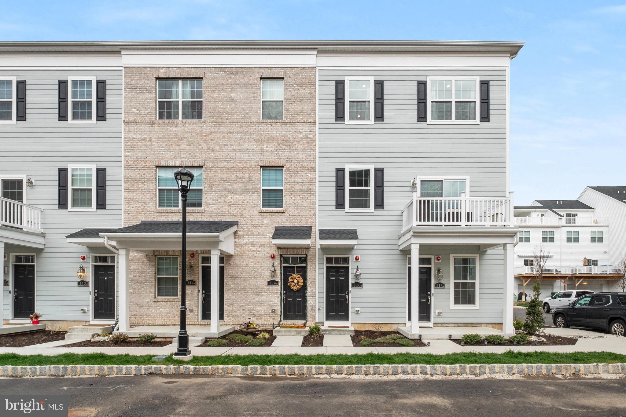 Location! Location! Location! Welcome to 116B King Street — a beautifully upgraded, corner-unit townhome in the highly desirable Waterside community of Bensalem. Built in 2022, this home offers stunning river views, a private in-unit elevator, and a modern, open-concept layout designed for comfort and convenience.
The main living level features a gourmet kitchen with white cabinetry, black backsplash, granite countertops, stainless steel appliances, Moen fixtures, pantry, and breakfast bar. The kitchen opens to a spacious dining and family room - perfect for relaxing or entertaining. A convenient powder room and laundry room with washer and dryer are also on this level.
The primary suite includes two walk-in closets and a private en-suite bath. Upstairs, you’ll find a generous second bedroom with full bath and an open loft space—ideal for an office or easy conversion to a third bedroom. The rear terrace off the loft offers even more outdoor living space.
Additional highlights include smart home features (video doorbell, Wi-Fi thermostats, smart lock) and a finished one-car garage with epoxy flooring.
Located just steps from the riverfront, this home offers the best of low-maintenance, luxury living with close proximity to dining, shopping, and major commuter routes.
Don’t miss this rare opportunity in one of Bensalem’s most sought-after communities!