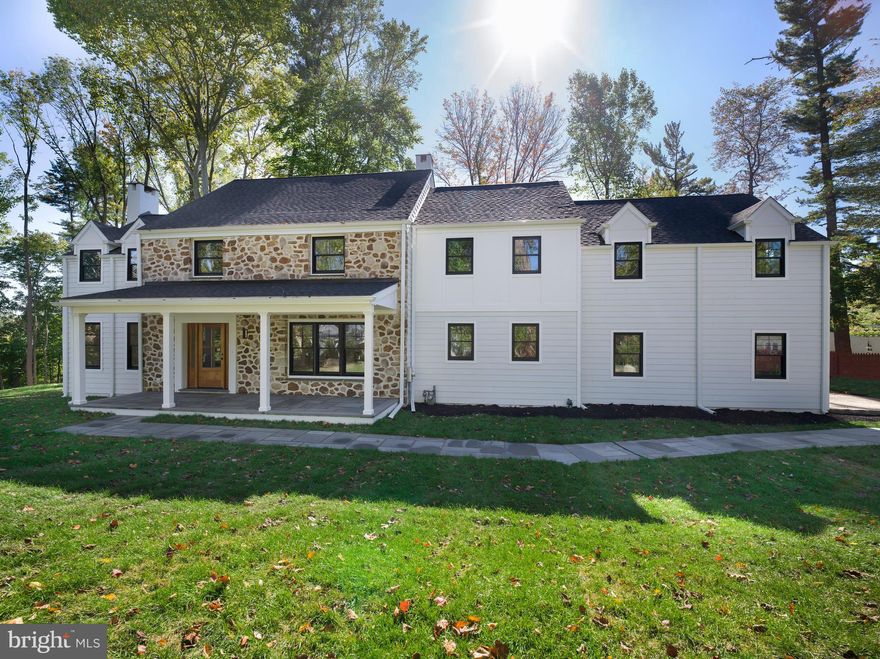 Welcome to 657 Lakeview Circle, a completely renovated home by well-respected BTR Construction, known for top-quality craftsmanship. Nestled on over an acre at the end of a highly desirable cul-de-sac in the award-winning Radnor School District, this home combines modern elegance with thoughtful design, offering incredible value. Every detail has been meticulously curated to reflect today’s aesthetic while ensuring timeless comfort throughout. The property offers all the features of new construction and comes with a custom builder warranty.
The private driveway leads to a 2-car garage, with a resident entry that includes custom-built lockers, closets, pantry storage and a convenient half bath. The main entry welcomes you with flagstone covered porch, closets for your guests and flows into a spacious living room with marble surround fireplace. The dining room is perfect for family gatherings or entertaining guests. Equipped with high-end appliances, the gourmet kitchen is appointed with a 48-inch Thermador range, microwave drawer, quartz countertops, and a marble backsplash and the all important SubZero refrigerator. It is open to the family room, which has a second fireplace and French doors that lead to another flagstone porch, offering expansive views of the serene rear yard. The first floor includes a bedroom suite with full bath, which could also function as a guest suite or home office. Wide-plank hardwood flooring runs throughout the first and second levels.
Upstairs, the primary bedroom suite has 2 walk-in closets and a luxurious spa-style bathroom with a soaking tub, dual vanities in warm wood tones, and classic Calcutta marble finishes. Bedroom
Suites 2 and 3 are filled with natural light and each has its own en-suite bath. Bedrooms 4 and 5 share a custom Jack & Jill bathroom, featuring a private shower area. All bedrooms are generous sized with spacious closets.  A full laundry room completes this level.
The finished lower level, with luxury waterproof vinyl flooring, offers expansive space perfect for entertaining or relaxing.
This home provides exceptional construction, generous & flexible living space, and a tranquil setting, all while being close to everything.