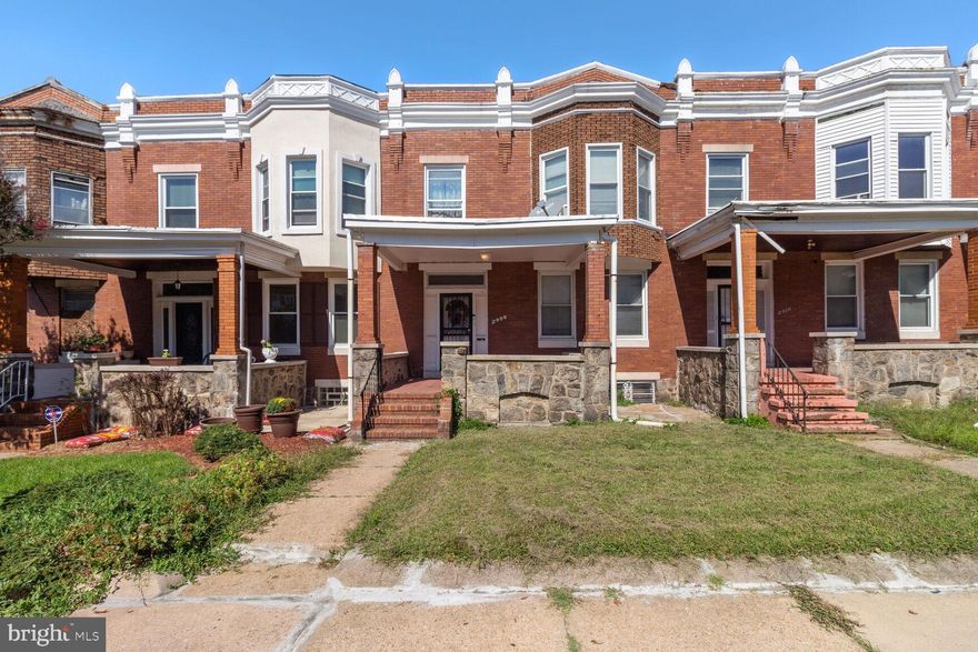 Charming, well-maintained rowhome conveniently located to near Lake Montebello! Enjoy hardwoods, generous room sizes, fresh paint, light and bright kitchen with new floors and access to sizable deck, rear yard and parking.  Seconds to universities, downtown, and major commuter routes.  Long term tenant in place with strong rental history.