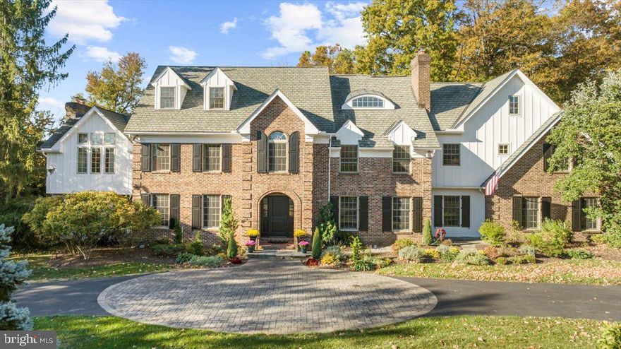 Location matters! The timeless design and solid construction of this custom estate home on a large lot is in one of the most coveted neighborhoods in Lower Gwynedd and top rated Wissahickon School District. Its quiet, walkable location can’t be beat!
This exquisite home features 7 bedrooms, 6 full baths, 2 half baths, mudroom with shower, finished 1400+ sq ft basement and an oversized 3+ car garage. You will appreciate the radiant heat throughout the foyer, kitchen, breakfast room, great room, powder room, mudroom and primary bath, along with 1 wood burning and 2 gas fireplaces. 4- zone HVAC, 400 amp service, internet and cable wired throughout, first floor and backyard sound system, and whole house water softener and filtration system are already in place.
The stately exterior of brick and Hardy plank siding, a circular driveway with oval paver entryway, flagstone path, mature trees and extensive landscaping offer welcoming curb appeal. The private, in-ground, heated, fully automated, saltwater pool and spa is highlighted by the stunning newly installed glass tile, PebbleTec surface, and new heater. The expansive EP Henry paver pool decking, patio, and walkway provide lots of space to entertain outdoors.
Upon entering the home, you are immediately drawn to the enormous crystal chandelier, hardwood staircase with open steel and brass wraparound railing extending 3 stories. A living room/flex space enclosed with 2 sets of glass doors and the dining room with gas fireplace and 2 sets of arched glass doors flank the foyer. 2 coat closets in the foyer provide plenty of storage.
From the foyer, enter the custom chef’s kitchen with its 12 ft island and corresponding wet bar, flowing into the bright breakfast room with vaulted ceiling where you can enjoy the view of your pool and backyard. The enormous kitchen with granite countertop and backsplash features a SubZero refrigerator, dual zone SubZero wine refrigerator, 2 beverage drawers, Dacor 6-burner gas range, Gaggenau steamer, Bosch dishwasher, double convection wall oven, warming drawer, island with convenient prep sink and plentiful storage. If that’s not enough, a custom wet bar with another wine refrigerator completes the space. There is a set of sliding glass doors from the kitchen into the screen porch that opens to the fenced pool area. Step down from the kitchen into the great room with wood burning fireplace and media center with surround system and custom oak built-ins. Sliding doors into the screen porch are most convenient. This flexible floor plan is sure to please. Down the hall past the powder room is a mudroom with access to the backyard. The bonus room off the garage entry offers access to the 2nd floor and the basement. Completing the first floor is an additional staircase off the kitchen leading to the finished basement with a convenient additional kitchenette and wall of cabinetry.
Ascend to the second floor where your primary bedroom suite awaits. Through the sitting room, step down into the enormous bedroom with a gas fireplace, surround sound system and vaulted ceiling. The entry to the marble bathroom is flanked by two walk-in closets. The bathroom features 2 custom Bombay vanities and 2 water closets, a jacuzzi tub and large walk-in shower. 2 bedrooms share the hallway at the top of the main staircase. Continue down the hall to find 3 linen closets, laundry room, 2 more bedrooms and the rear staircase.
The third floor with its cozy reading nook is away from the bustle of the rest of the house. 2 cedar closets, a bedroom with separate workspace, walk-in cedar closet and an additional bedroom with access to the utility/storage room complete the 3rd floor.
Conveniently located near Springhouse shopping center, with easy access to Rt 309 & Rt 202, PA Tpk and commuter trains to Philadelphia, this timeless beauty checks all the boxes!