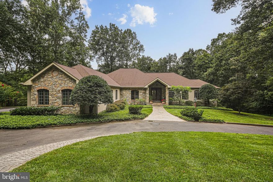 Welcome to 3651 Broadleaf Ct - an extraordinary estate in the exclusive Cattail Creek Country Club community. Perfectly positioned on a private 3.35-acre cul-de-sac lot, this residence offers over 7,700 total square feet of refined living space, blending sophistication with comfort in one of the region’s most sought-after settings. A stone front porch and grand foyer welcome family and friends as you enter this magnificent home.   Entertain with ease in the expansive dining room featuring a custom built-in bar, or gather in the warm family room accented by a dramatic stone fireplace. The gourmet kitchen is a chef’s dream, boasting vaulted ceilings with skylight, granite countertops, large island, high-end appliances including a double oven, Sub-Zero refrigerator, gas cooktop, and generous pantry. A sunny breakfast area, tray-ceiling living room, private office with fireplace and built-ins, and a large laundry room complete the main level.  The luxurious primary suite offers a vaulted ceiling, dual walk-in closets, dressing area, and spa-like bath with jacuzzi tub, walk-in shower, and dual vanities. Two additional bedrooms share a full bath with dual vanity. The finished lower level is designed for entertaining and multi-generational living with a spacious rec room with built-in entertainment center, a full commercial grade bar with sink, refrigerator, and wine unit, a guest bedroom, full bath with steam shower and dual vanity, and bonus room. Ample storage ensures everything has its place.  Outdoor living is unmatched with a Trex deck and an extensive stone patio featuring an in-ground spa and fire pit, all overlooking the fifth hole of Cattail Creek—affectionately known as “the rock hole” or “the cliff hole.” Thoughtful exterior lighting and professional landscaping add to the ambiance. Additional highlights include a circular driveway, 3-car garage, and whole-house generator. This remarkable home offers elegance, privacy, and the ultimate country club lifestyle in a premier location. Schedule your tour today!