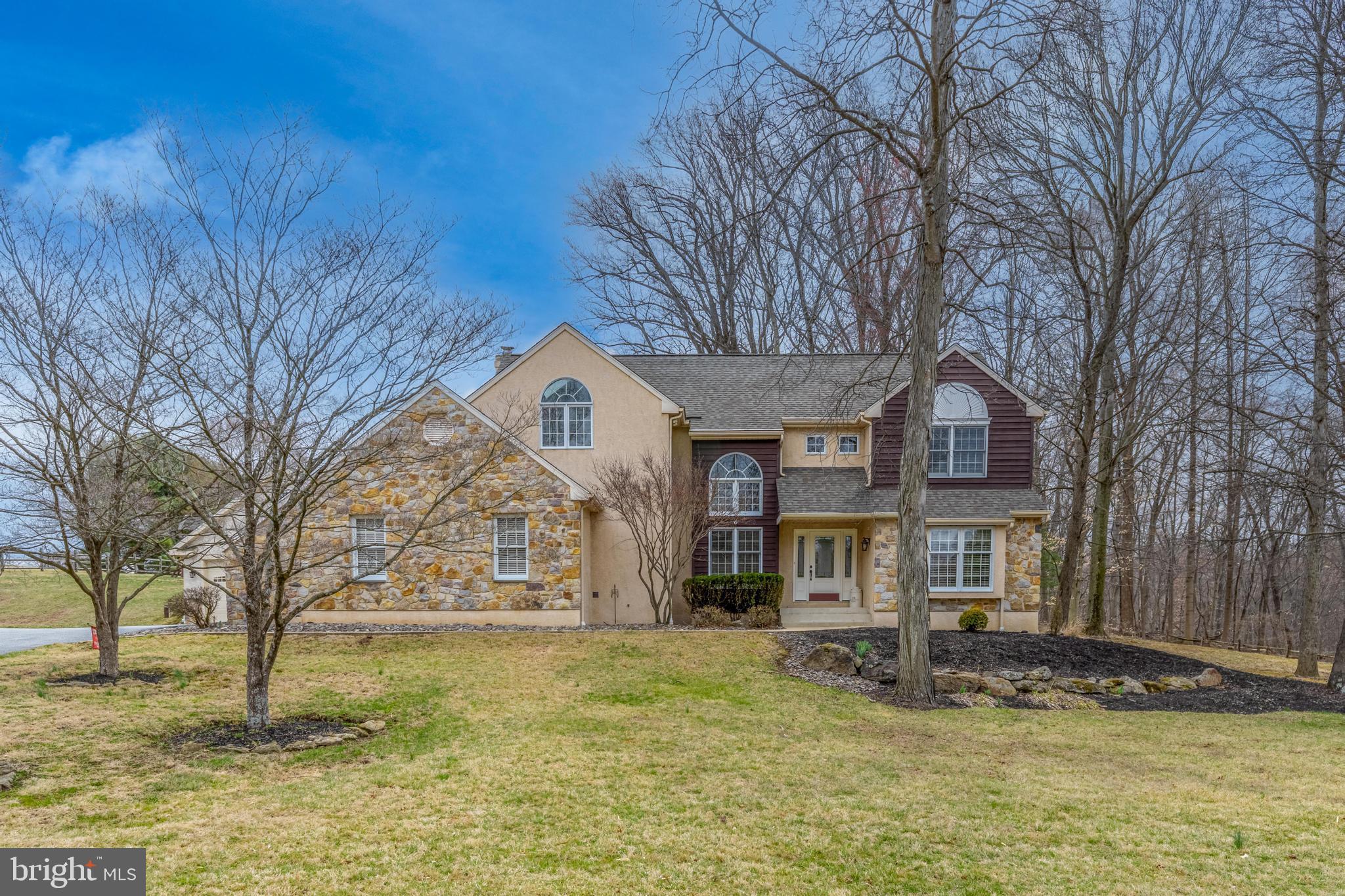 Welcome to this beautiful, meticulously maintained home in the sought-after Barton Meadows neighborhood — no HOA and nestled in the award-winning Owen J. Roberts School District! Step into a grand two-story entryway that sets the stage for the elegant layout. To the side, you’ll find a formal living room and dining room, complete with crown molding, gleaming hardwood floors, and oversized windows that flood the space with natural light. The updated kitchen boasts stylish cabinetry, ample counter space, and an adjoining sunroom-style breakfast area overlooking the picturesque backyard — perfect for morning coffee or casual meals. The sunken family room offers a warm and inviting atmosphere, featuring a wood-burning fireplace with a charming stone hearth and wood mantle. Upstairs, the spacious primary suite is a true retreat, offering his and hers walk-in closets and a luxurious 5-piece ensuite bath — complete with soaring ceilings, separate vanities, a walk-in shower, and a relaxing whirlpool tub. Three additional bedrooms are all generously sized, each with great closet space, and share an updated hall bath. The finished basement offers even more living space — ideal for a home theater, game room, gym, or extra storage. Step outside to your own private oasis — a heated in-ground saltwater pool, ideal for summer entertaining. The 1.5-acre lot provides plenty of space to roam, garden, or play. With an attached 2-car garage and a detached 2-car garage, you’ll have all the storage or hobby space you could want. This home truly has it all — space, style, and location. Don’t miss the chance to make it yours!