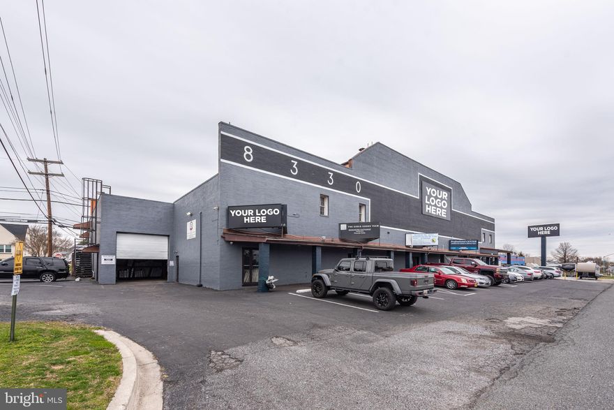 INCREDIBLE OPPORTUNITY FOR AN ESTABLISHED BUSINESS TO HAVE A LARGE SHOWROOM WITH OFFICES AND A WAREHOUSE IN A HIGHLY VISIBLE LOCATION!    Features include a large showroom/retail area with a glass enclosed conference room, 6 separate offices, a separate mens and womens restroom, and a large warehouse with a drive-in door, loft area, and plenty of storage space.  Excellent street visibility with unassigned parking in the front of the building and a private side lot.  Plenty of space for business signage including the center of the building and separate stand alone road sign.  Triple net lease - CAM estimated to be $800/mo.