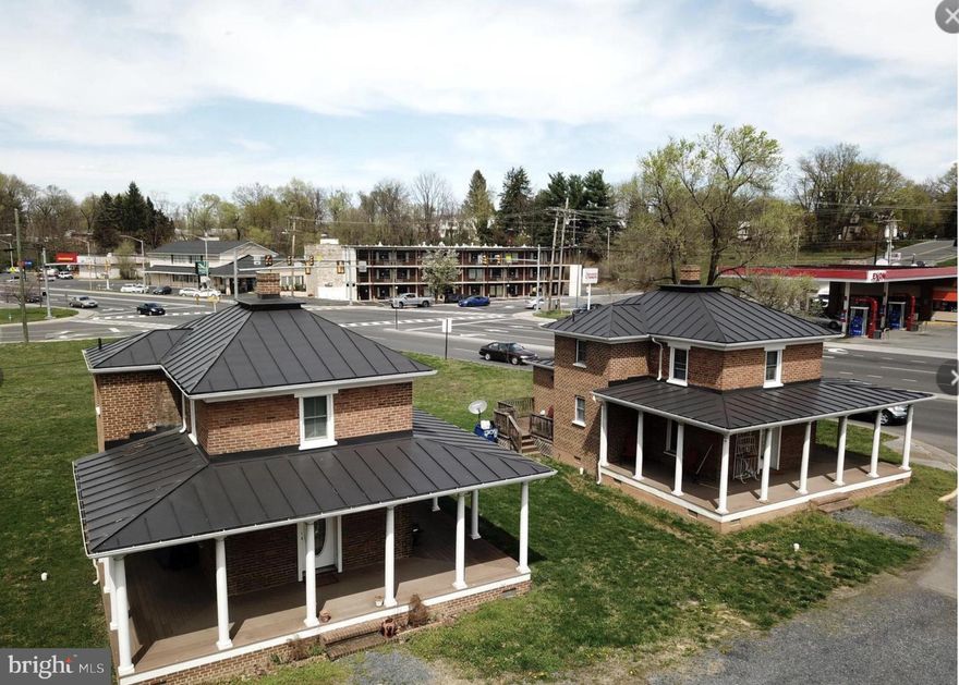 Discover a rare and multifaceted real estate opportunity in the heart of Front Royal, where residential charm meets unlimited commercial potential. This expansive one-acre offering encompasses seven contiguous parcels being sold as a single, cohesive estate. The property features two beautifully renovated homes, each distinguished by massive wrap-around porches designed to capture stunning, unobstructed views of the Shenandoah Mountains.

The entire site is zoned C1, providing an incredible breadth of permitted uses that range from professional medical and office spaces to retail storefronts or additional rental development. Whether you are looking to establish a high-end short-term rental compound, a long-term residential lease, or a commercial headquarters, the versatility here is unmatched. While approximately one-third of an acre sits within a designated flood plain, the property remains high and dry, leaving ample room for additional improvements, expanded parking, or new construction.

The location perfectly balances "in-town" convenience with a connection to nature. The property’s entire western border is flanked by a lush, town-owned community trail, offering immediate access to tree-covered paths for walking and biking. Despite this tranquil setting, you remain within easy walking distance of downtown Front Royal’s vibrant restaurant scene and local attractions. This is a premier example of walkable, flexible living—a turn-key investment with the space and zoning to grow with your vision. Detailed permitted uses are available for review in the listing documents. See additional info: VAWR2012754