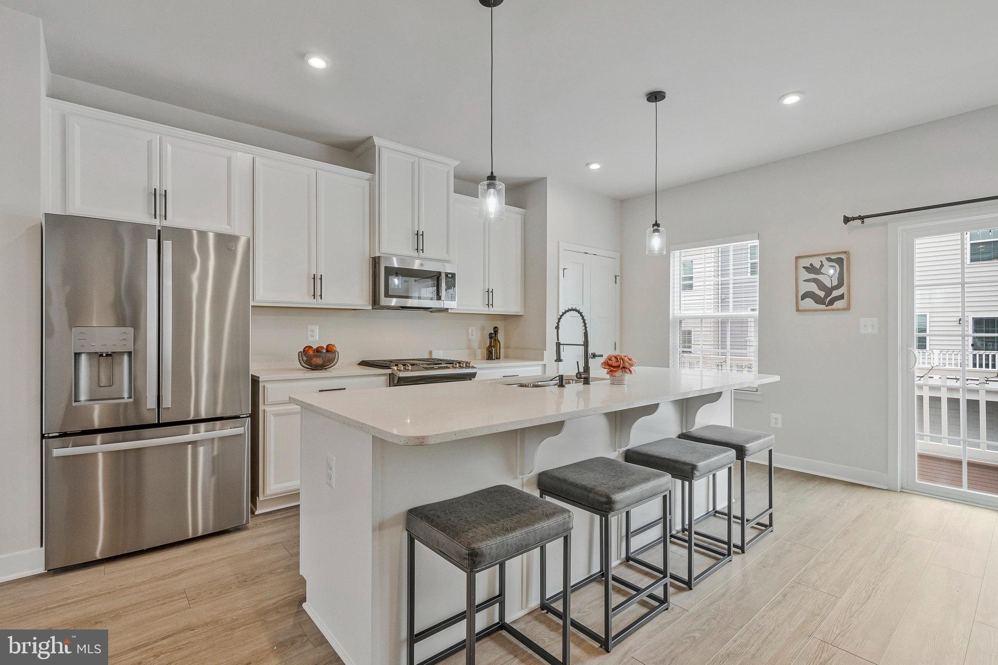 Welcome to your next home in Arcola ! This stylish townhome was built in 2023 and offers 3 bedrooms, 4 bathrooms, and nearly 1,800 sq ft of modern, low-maintenance living in one of Loudoun County’s most convenient locations.
Inside, you’ll find an open, sunlit layout with a sleek kitchen, spacious living and dining areas, and plenty of thoughtful upgrades throughout. Whether you're entertaining guests or enjoying a quiet night in, this home fits your lifestyle perfectly.
Outside, enjoy the charm of a brick-front exterior, a 2-car garage, and additional driveway parking. With low HOA fees, a vibrant community vibe, and easy access to shopping, dining, commuter routes, and Dulles Airport, everything you need is right here.
Zoned for Loudoun County Public Schools and move-in ready—this home truly has it all! Don’t miss this incredible opportunity to own a like-new townhouse in a beautiful, vibrant community! Listing agent is also the property owner.