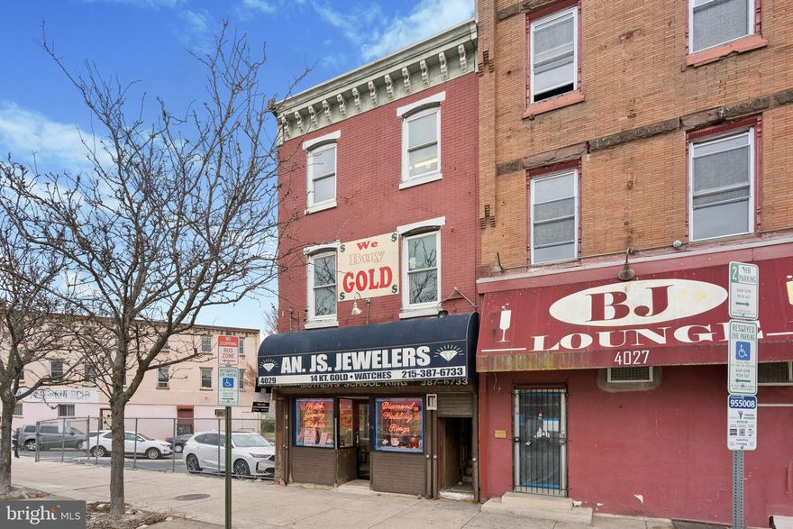 Prime redevelopment or owner-user opportunity in University City / West Powelton.
4029–4033 Lancaster Avenue, Philadelphia, PA 19104

This offering includes three contiguous parcels totaling 2,920 SF of land, featuring a 2,539 SF three-story mixed-use building at 4029 Lancaster Avenue and two adjacent paved lots at 4031 and 4033 Lancaster Avenue. The corner location at Lancaster and Wallace offers excellent visibility and frontage on a high-traffic commercial corridor.

The first floor is currently built out as a long-standing jewelry store with 35 years of history. The 2nd and 3rd floors contain two apartments in need of full renovation, providing a strong value-add opportunity for investors or owner-occupants seeking additional rental income.

The property includes a private parking lot—a rare amenity in this submarket—that could also support future development or expansion. Zoning is CMX-2 (Neighborhood Commercial Mixed-Use), allowing for a wide range of retail, residential, and office uses.

Located within steps of SEPTA bus and trolley routes, this property benefits from excellent public transportation access and strong proximity to University City, Drexel University, and the Penn health and research campuses.

Offered as-is, this property provides an affordable entry point or redevelopment opportunity in one of Philadelphia’s most dynamic and rapidly evolving commercial corridors.