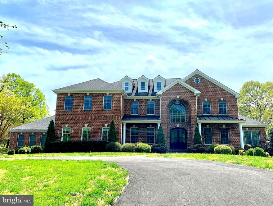 TWO HOUSE in One-of-a-kind custom built, all brick home on 5 acres in Clifton, VA. This home located in the Wyckland neighborhood is move in ready! 5 huge bedrooms,4 full & 2 half baths. This house with attached guest house with 1,700 square living must be seen! There are essentially 2 homes here that can lend themselves. It is perfect for the in-laws/grandparents to be close. Completely private guest house! It consists of separate entrances,2 car garage, 10.5 ft ceilings w/many windows that make the space bright & airy,1 large bedroom w/private balcony, 1.5 baths, laundry, office/den & full eat-in kitchen w/granite counters which opens to the large living area. There are Brazilian Cherry floors & separate staircase to the basement. The main house is gorgeous! Its open floor plan is spacious & welcoming. The main level has an attached 3 car garage,10.5 ft ceilings, detailed moldings, Brazilian Cherry floors & large windows. The gourmet kitchen is truly the heart of this home. The cabinets are customized to the space & designed w/matching panels to cover both Sub-Zero full-size refrigerator, full-size freezer & Bosch dishwasher. The Wolf double wall ovens & warming drawer plus Dacor 6-burner gas cooktop located in the center island are a chef s dream! The walk-in pantry provides loads of storage. The kitchen opens to the huge family room w/gas fireplace set in the floor to ceiling stone wall, complete w/custom wooden mantle built from an old Clifton barn. Open the back door to the expansive, long-lasting Ipe Wood deck screened porch. The deck steps flow out onto the professionally landscaped backyard w/multi-level patio & firepit. Also, off the kitchen is the huge dining room w/2 wrought iron chandeliers. The formal living room & bright sunroom. The main hall is the office with 2 custom built-in desks & cabinetry. There are 2 staircases lead up to the second floor one from the front hall/foyer the other located off the family room. Upstairs you owner s suite and the large sitting area/lit tray ceiling. And the bright & spacious bedroom & balcony overlooking the backyard. The master bath, w/its jetted tub & large glass enclosed shower w/multiple shower heads, double sinks. Two large bedrooms, each w/their own walk-in-closet that share a Jack-and-Jill bathroom w/granite counters & double sinks.                   End of the hall are the linen close & conveniently located laundry room, w/plenty of hanging space, storage cabinets & utility sink. The fourth bedroom is huge & has 3 large windows looking out to the beautiful front yard. The full bathroom right next door. The last room upstairs is a bonus room utilized in many way, craft/hobby room or den, partially finished walk-out basement the electrical & drywall work has been completed. All that remains is the fun part! You get to choose flooring, finishes & paint colors. The full bathroom & wet bar are roughed in & ready to be designed. There is limitless potential for a wine cellar, media room, playroom, home gym, game room or guest room. It all leads out to the backyard patio & firepit. There is a garden garage to keep all the yard tools out of the way & easily accessible. This home is extremely energy efficient due, in part, to the 2x6 framing & all brick construction of the exterior walls. More amenities include water treatment system, water softener, security system, central vacuum. This is a wonderful place to call home, just minutes from the charming town of Clifton!