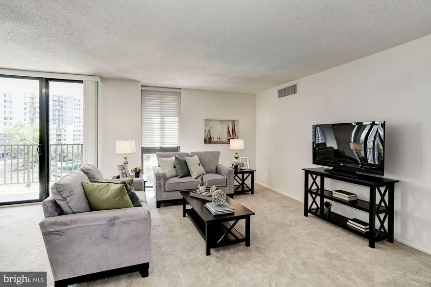 Gorgeous condo in the heart of McLean with beautiful view of swimming pool. Updated kitchen with quartz counter tops and stainless steel appliances. Two spacious bedrooms and two baths. Plenty of closet space. Washer/dryer in unit. Balcony, pool, tennis courts, and fitness center. Secured building w/Concierge. Walk to shops and restaurants. Close to the metro. Seller requests MBH Settlement Group.