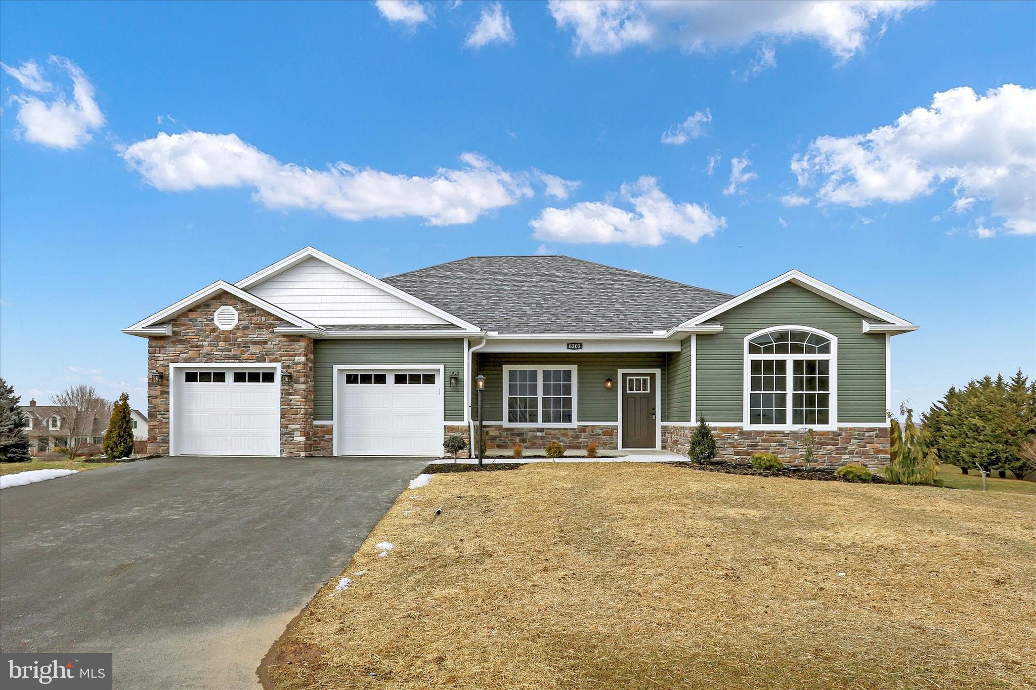 New Construction! This 3 bedroom home built by Comstock Homes is within award-winning Penn National Community. Home is in an established master plan neighborhood. Granite countertops in kitchen and bathrooms, flooring is LVT in main areas. Bedrooms are carpeted. Kitchen includes appliances and cabinetry. Tray ceilings in Primary bedroom and Great Room. Bonus finished space is in the walkout lower level, plus another full bath. Efficient electric heat and central A/C. Neighborhood is subject to protective covenants. Lovely walkable community offers 36 holes of 4-star golf, outdoor pool, tennis/pickleball, yoga, community garden, hiking in Michaux State Forest, 40 + social clubs, restaurant/bar, and so much more! See Pro Shop for membership details.