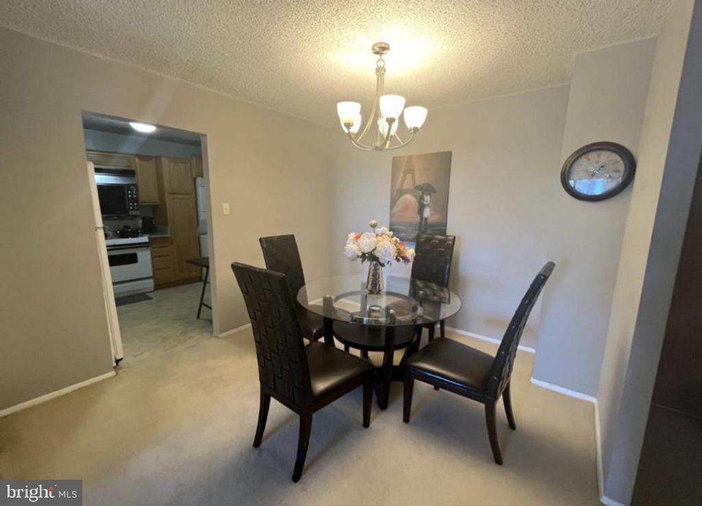 Photo of 1800 Old Meadow Road #1215, MCLEAN, VA 22102 (MLS # VAFX2277844)