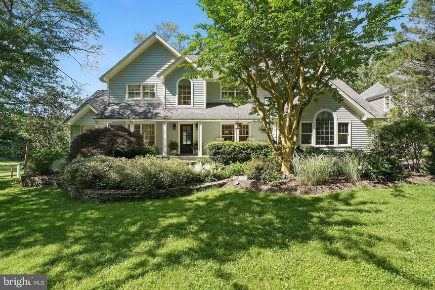 This incredible move-in ready home is ideally situated on a beautiful lot moments to River Bend Park & the Potomac River.  It features an inviting front porch, a fenced yard, an oversized garage, and professionally landscaped grounds enhanced with hardscape vignettes and lovely walkways. The home boasts six bedrooms and four full bathrooms, with hardwood floors throughout the main level. Its open floor plan is perfect for both entertaining and everyday living, highlighted by a custom gas fireplace with an oversized granite surround, as well as dining and living spaces with vaulted ceilings. A bedroom and a full bathroom on the main level add convenience and flexibility. The expansive, bright beautiful gourmet kitchen includes a built-in planning desk, custom cabinets, and shelving, providing abundant storage, and opens to a spacious breakfast and dining area. The master suite offers a luxurious retreat, complete with a master bath that includes an oversized spa bathtub and a custom vanity. Generously sized secondary bedrooms provide ample space for family or guests. The finished walk-out lower level adds recreation space, featuring a media area, a game room with a bar, a bedroom, a den, a full bathroom, and an additional space that can serve as a gym.   This home is a real showstopper with highly rated Fairfax County schools - Great Falls Elementary, Cooper Middle and Langley High School.  Don't miss it!