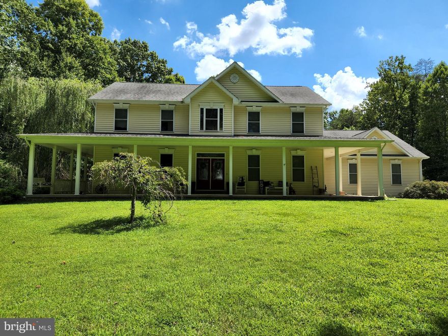 Just Reduced!!  Don't miss out!!  Beautiful Custom Built Colonial on 22 Private Acres!!  This home features a first floor master bedroom with walk in closet.  Gourmet kitchen with granite counters, island, SS appliances,  cooktop, wall oven.  Open floor plan with the 2 story living room!  Hardwood floors in main living area.   Enjoy the outdoors on the wrap around porch!   This home also has a huge 3 car oversized garage!  Tons of potential here!!!  24 hour notice required for all showings.  Google maps does not take you to the house, please see directions section.  Home sold strickly AS IS.