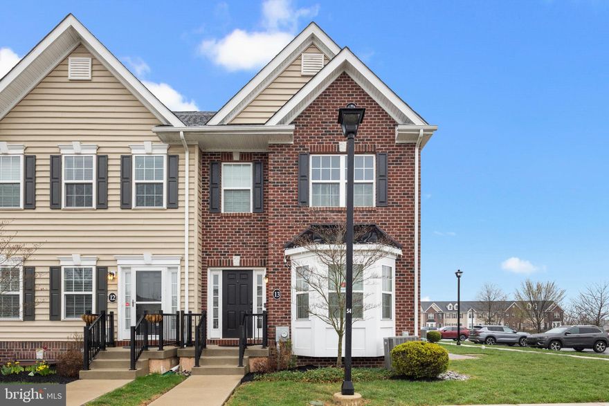 Welcome to this stunning 3 bedroom, 2.5 bath end-unit townhome nestled in the highly sought-after Carriage Hill community. Boasting a finished basement for flexible living, this home offers both style and functionality. The upgraded kitchen is a chef's dream with granite countertops, a convenient island, a pantry, and sleek stainless steel appliances.  Just off of the kitchen you will find sliding doors that  lead to your own private patio area that is perfect for entertaining or relaxing with beautiful panoramic views.  Retreat to the primary bedroom featuring a spacious walk-in closet and an ensuite bathroom complete with a double sink vanity, walk-in shower, and linen closet. The secondary bedroom also offers a generous walk-in closet. A well-appointed hall bathroom includes a shower/tub combo. The private third bedroom is located on the upper floor. Expand your living space in the finished basement – perfect for a family room, media center, playroom, or home office.  Enjoy outdoor recreation just steps away at Hanusey Park with walking trails, basketball courts, soccer fields, and a playground. Located within the highly-rated Central Bucks School District.