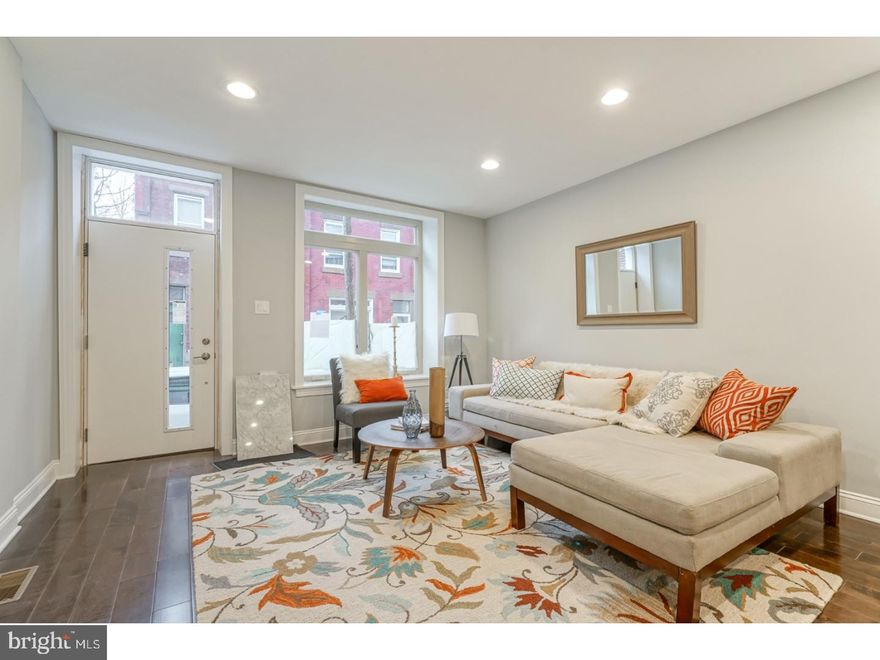 Better then new construction! 10 YEAR TAX ABATEMENT! Great block in Point Breeze - a stone throw away from Wharton Square Park! Fully customized, 3-story home + roof deck. Build out on 3rd floor offering an additional deck and a spiral staircase leading up to the roof deck with unobstructed views of center city. This home features 3 large bedrooms and 2.5 bathrooms.  Open-concept layout in living/dining room area featuring 16ft. high ceilings! Tons of cabinetry and counter top space in kitchen. Fully finished basement for extra living space. Second level offers two spacious bedrooms, custom full bathroom, linon closet and laundry room. The master suite level is the entire third floor, including a huge walk-in closet and custom master bathroom. The third level also features a back deck with a spiral stair case leading to roof deck containing unobstructed views of center city. Easy street parking around Wharton Sq Park.