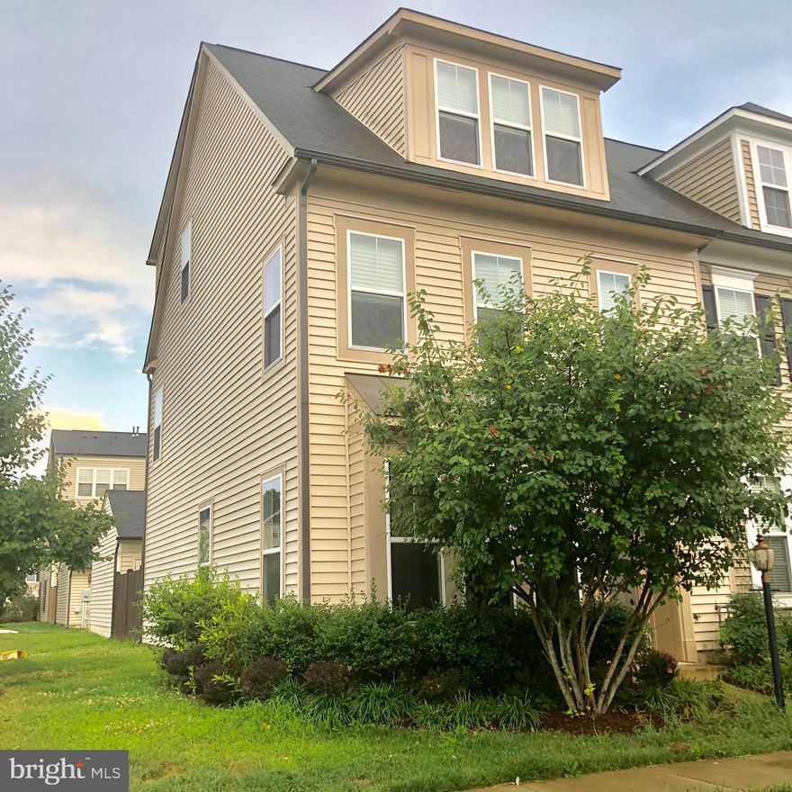 Rare town house model with detached 2 car rear entry garage- 2300+ square feet of living area with living, dining, open kitchen with GRANITE island. Every floor with large sitting areas. Luxury shower and master suite with tray ceiling. Fresh Paint and New Carpet. Walk to victory elementary school and community center. etc. VRE and park n ride mins away.